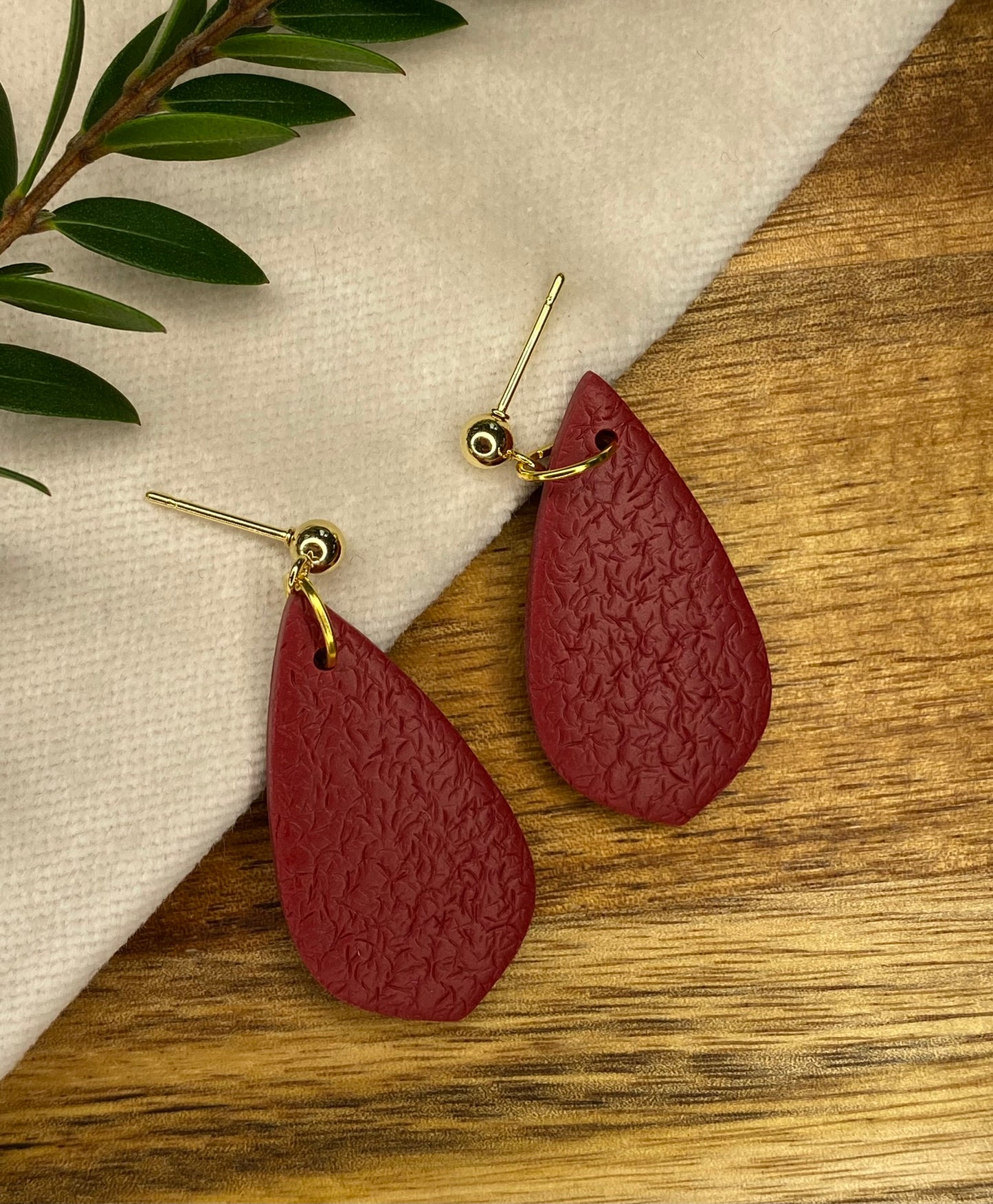 Medium dangles - textured burgundy teardrops