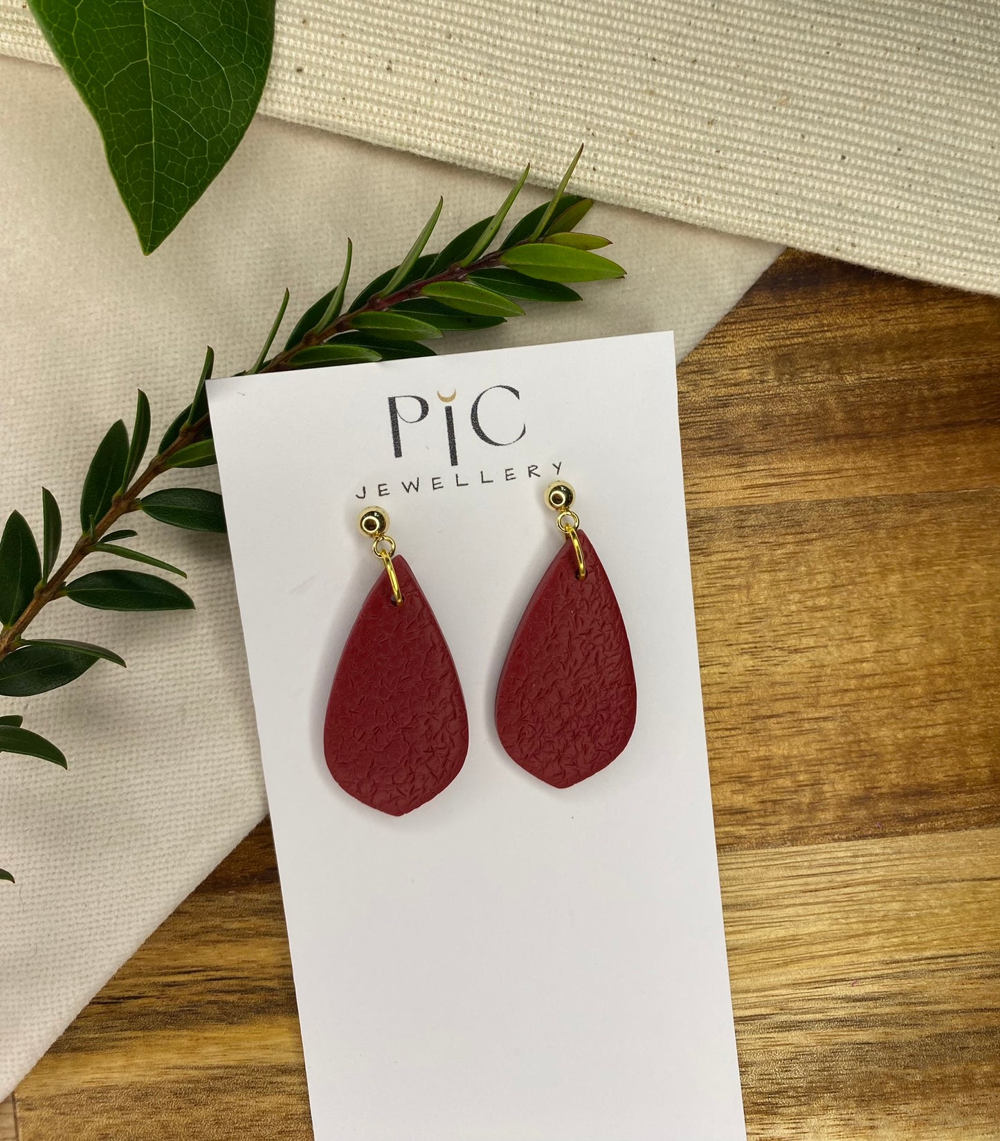 Medium dangles - textured burgundy teardrops