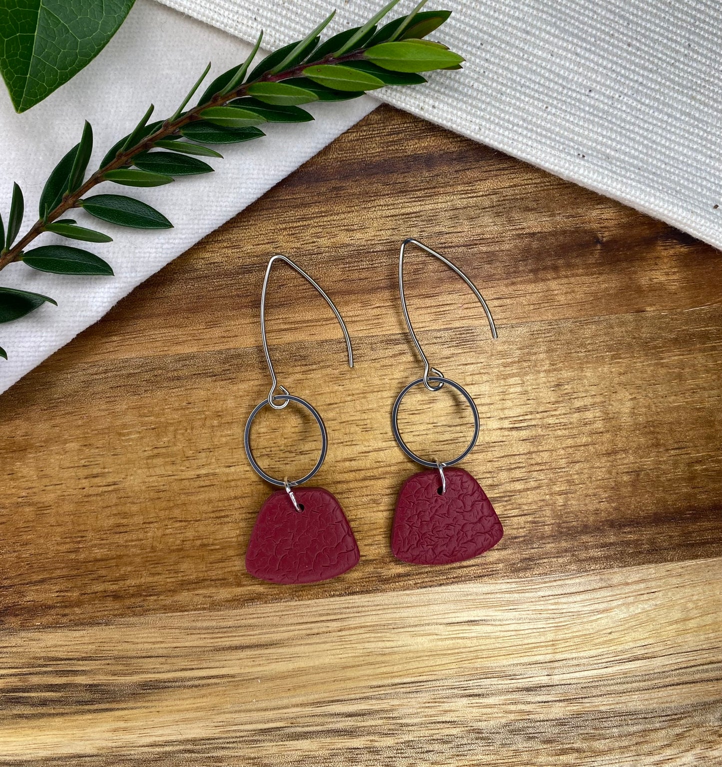 Statement dangles - textured burgundy rounded trapezium and silver circle