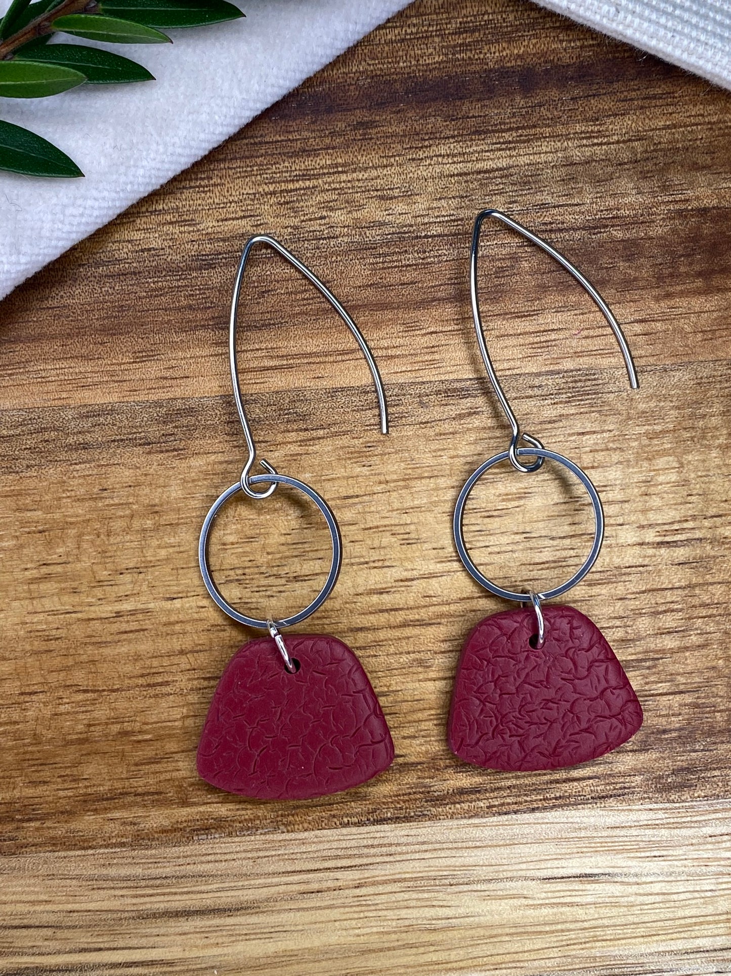 Statement dangles - textured burgundy rounded trapezium and silver circle