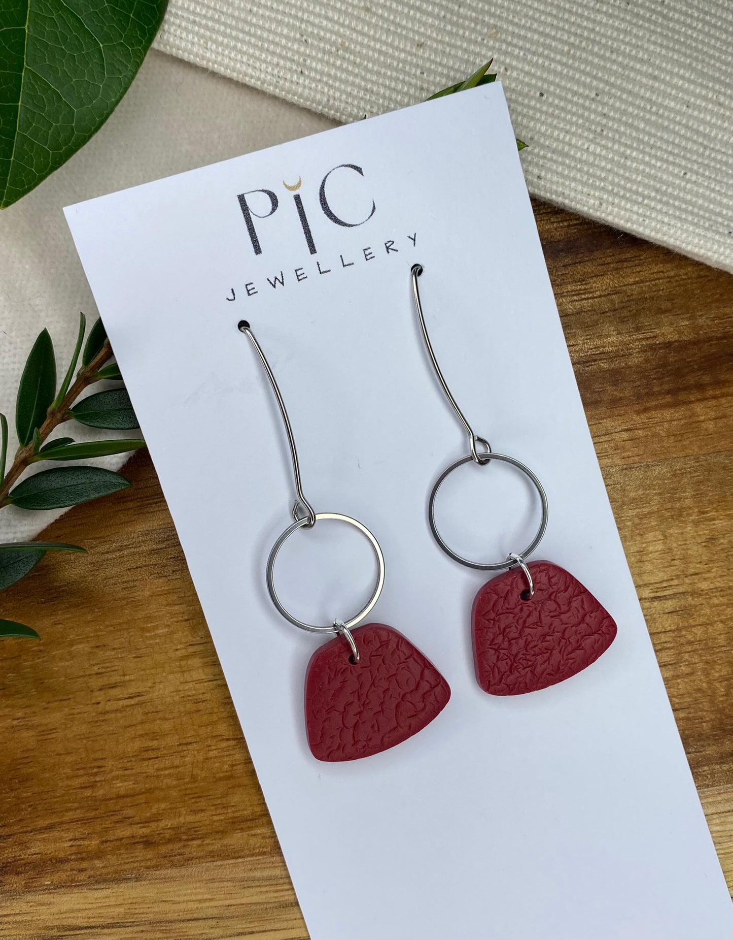 Statement dangles - textured burgundy rounded trapezium and silver circle