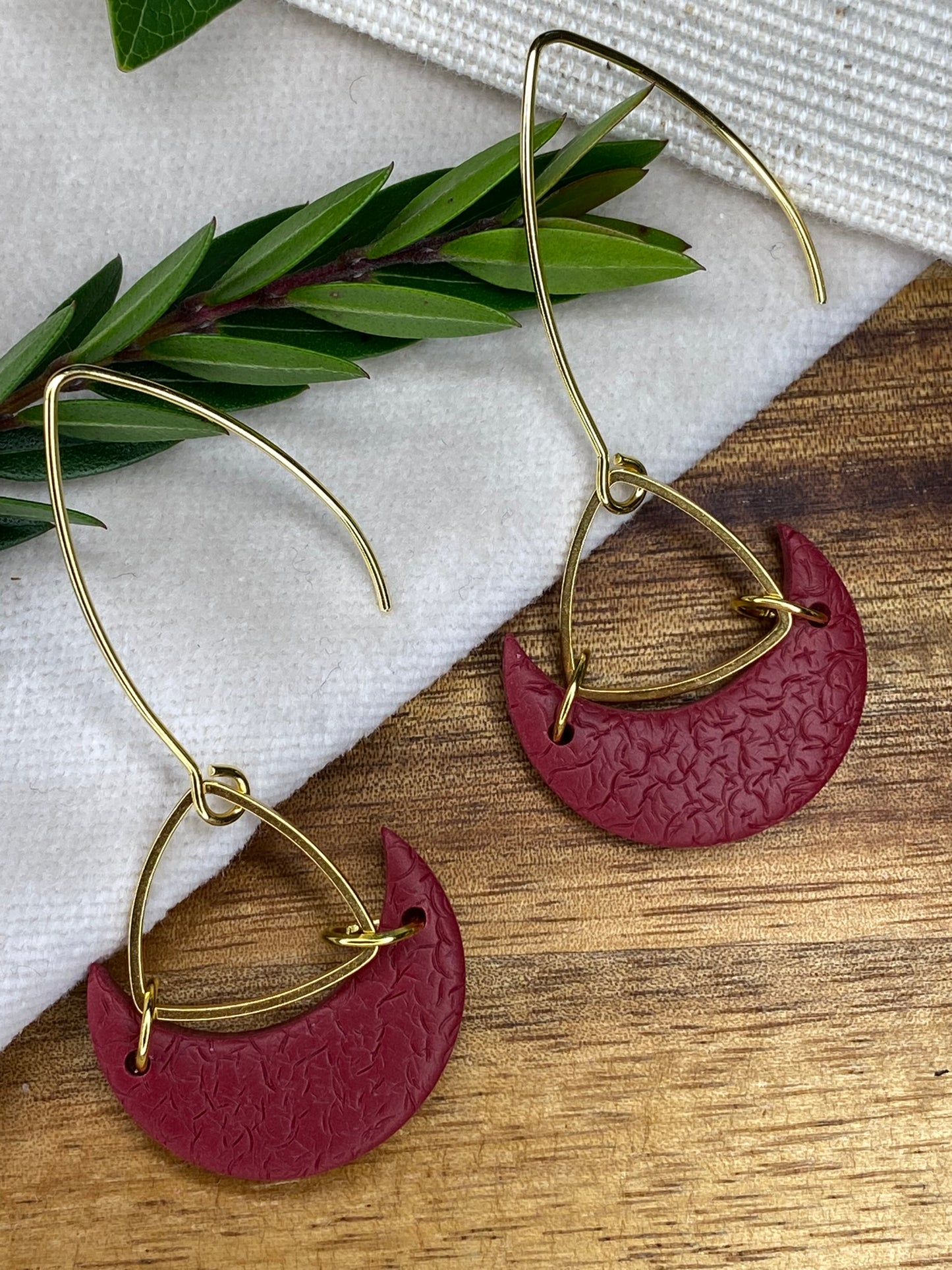 Statement dangles - textured burgundy moons with gold triangle