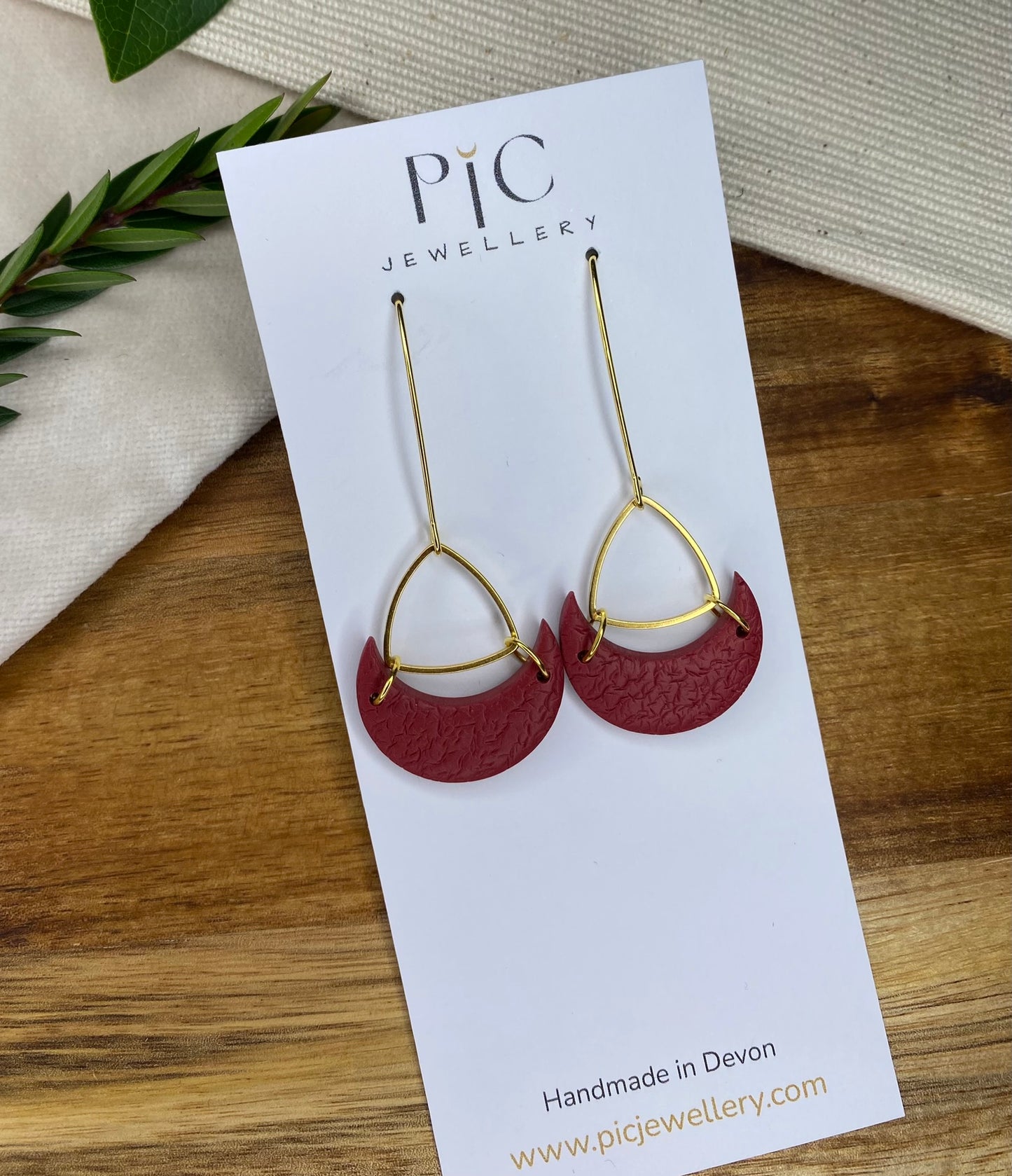 Statement dangles - textured burgundy moons with gold triangle