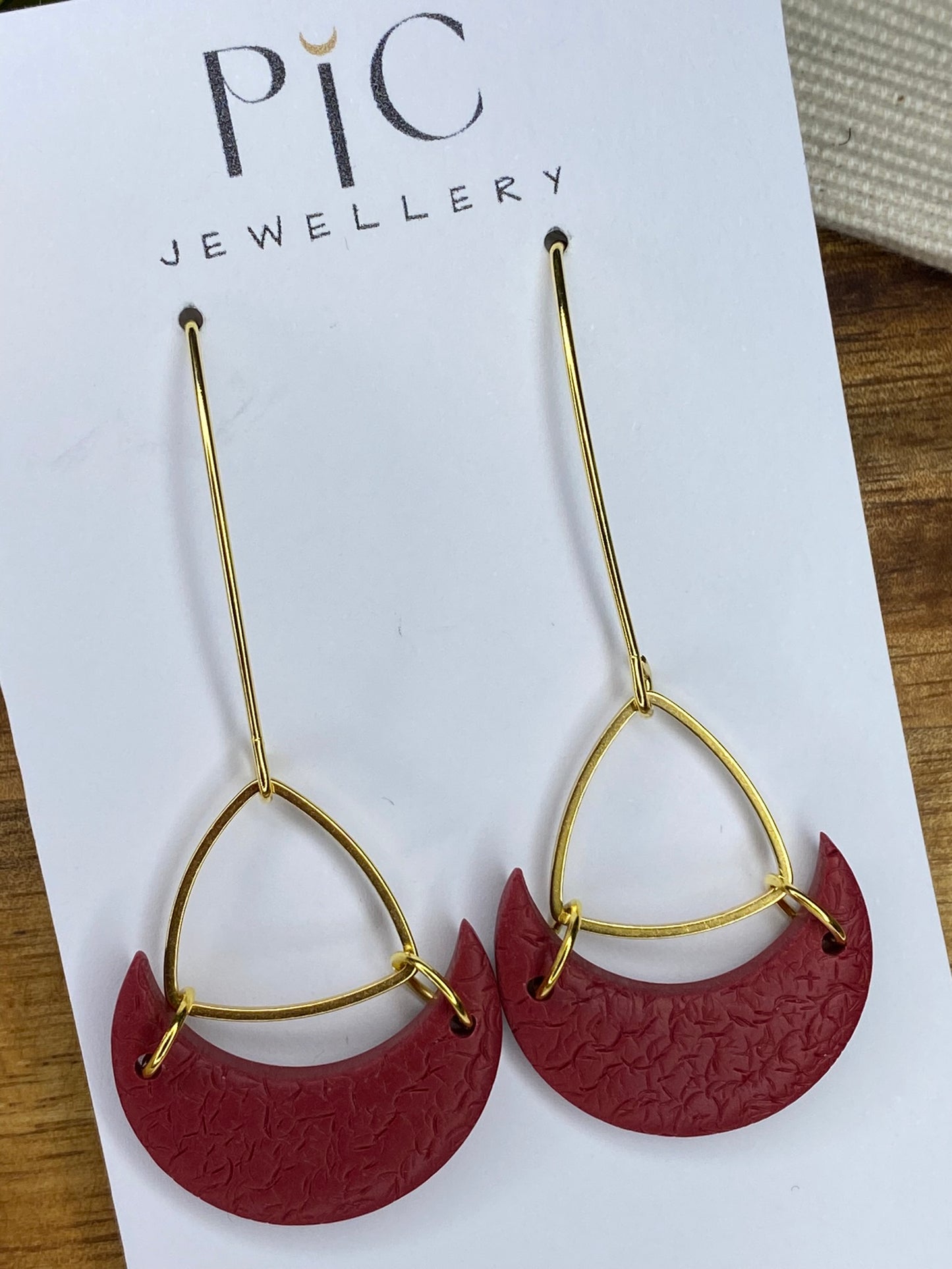 Statement dangles - textured burgundy moons with gold triangle