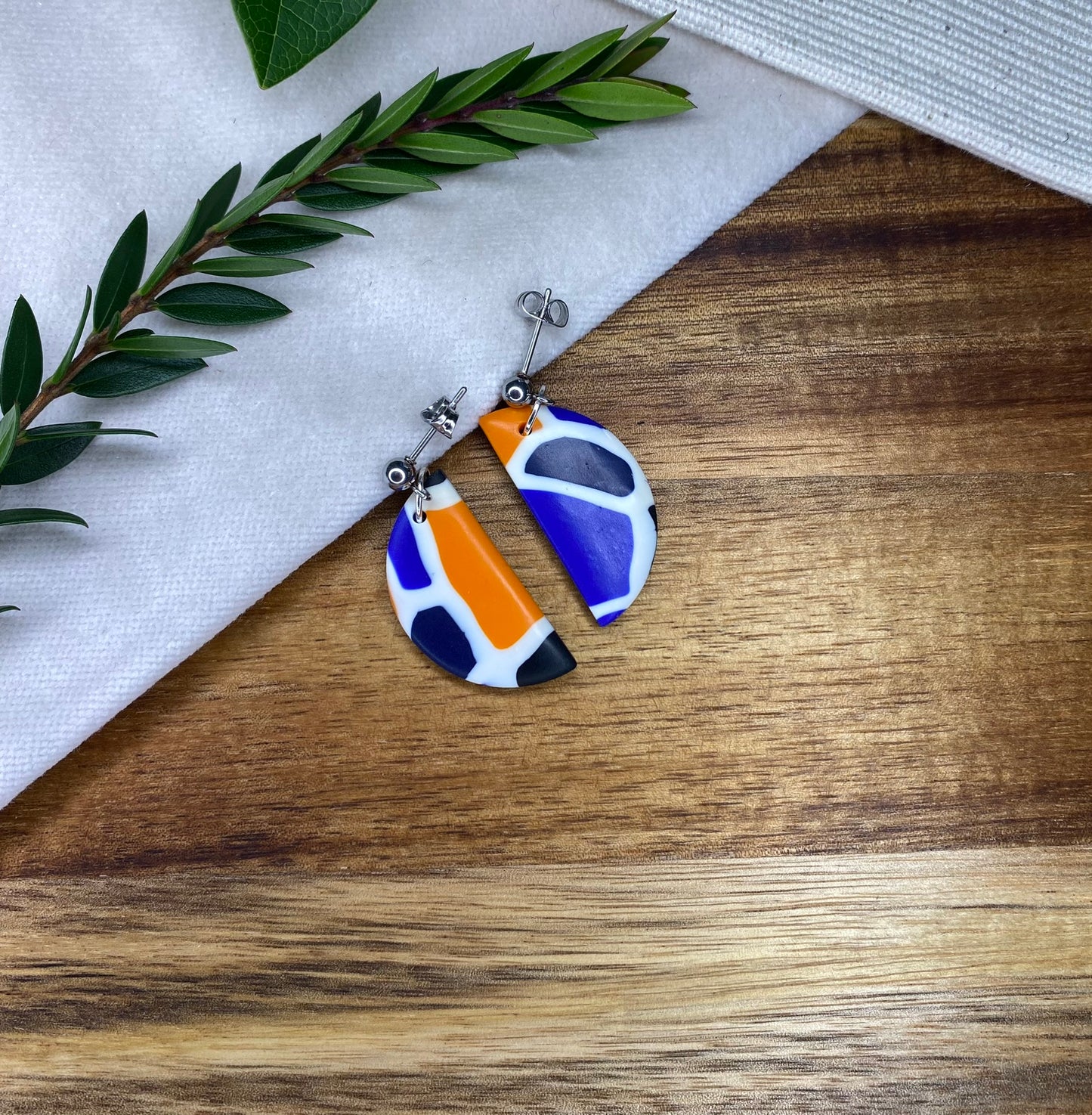 Medium dangles - blue, orange, white and black mix semi-circles