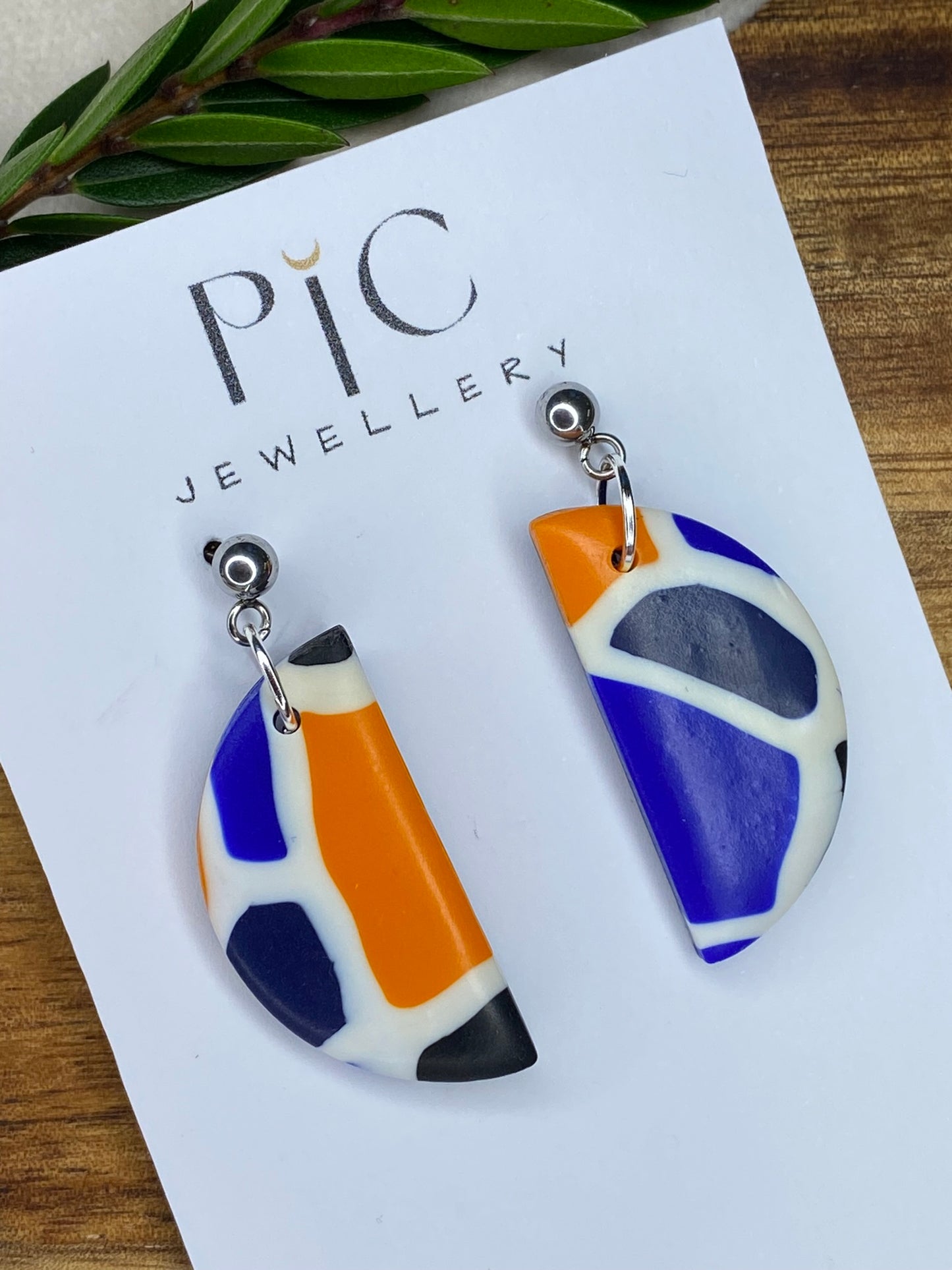 Medium dangles - blue, orange, white and black mix semi-circles