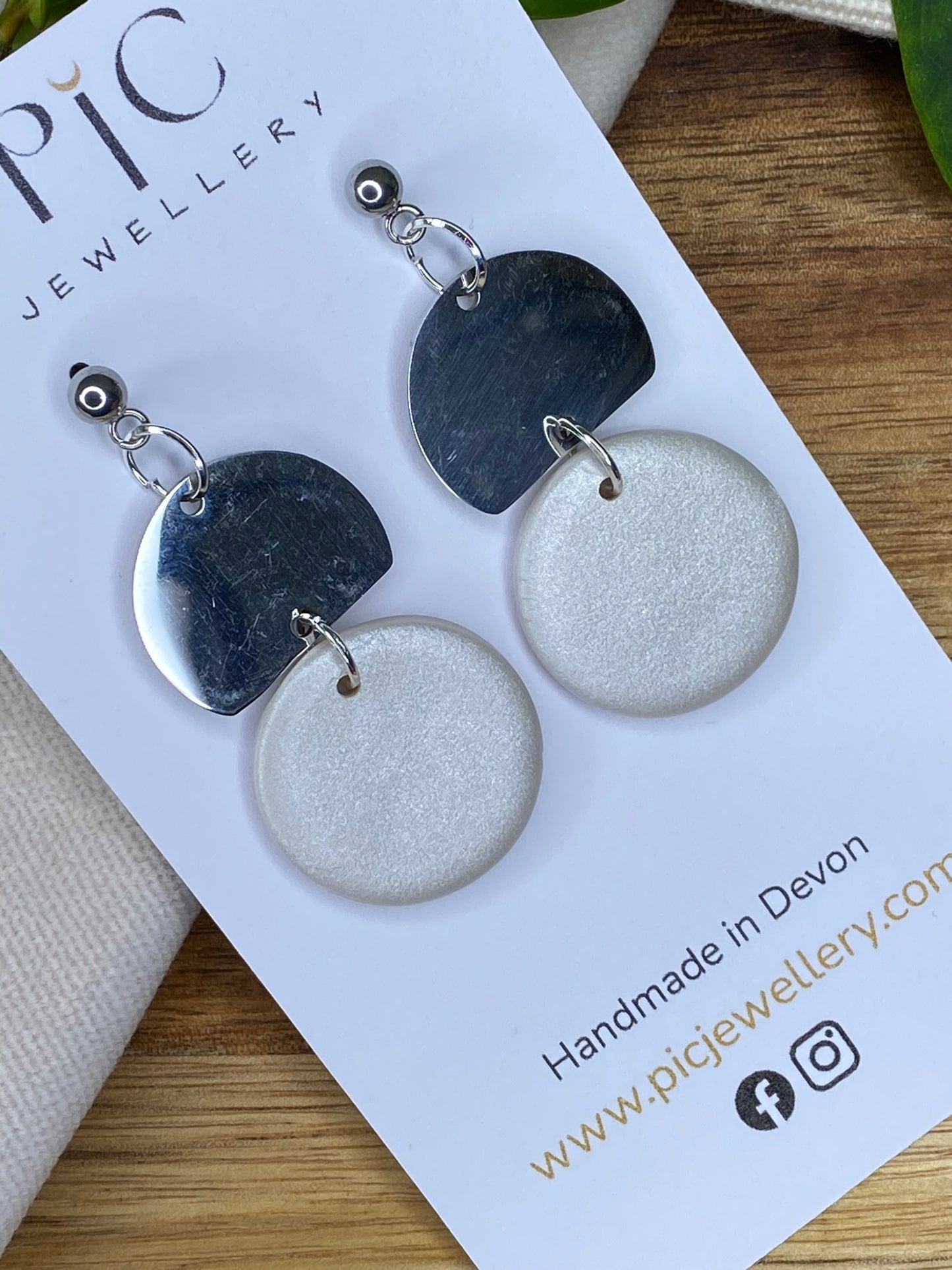 Statement dangles - pearlescent circles with stainless steel metal circle segment