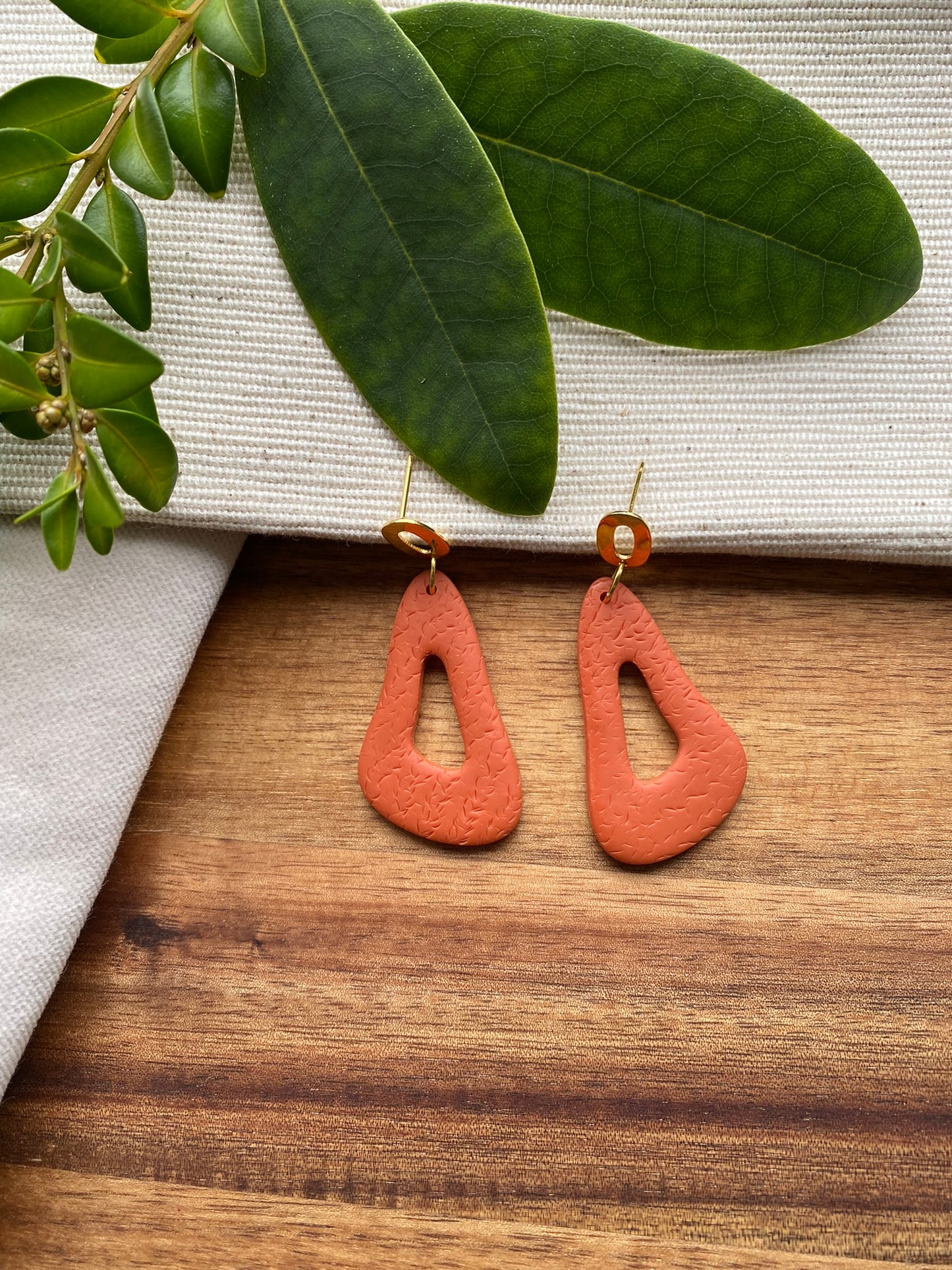 Medium dangles - orange organic wavy triangle