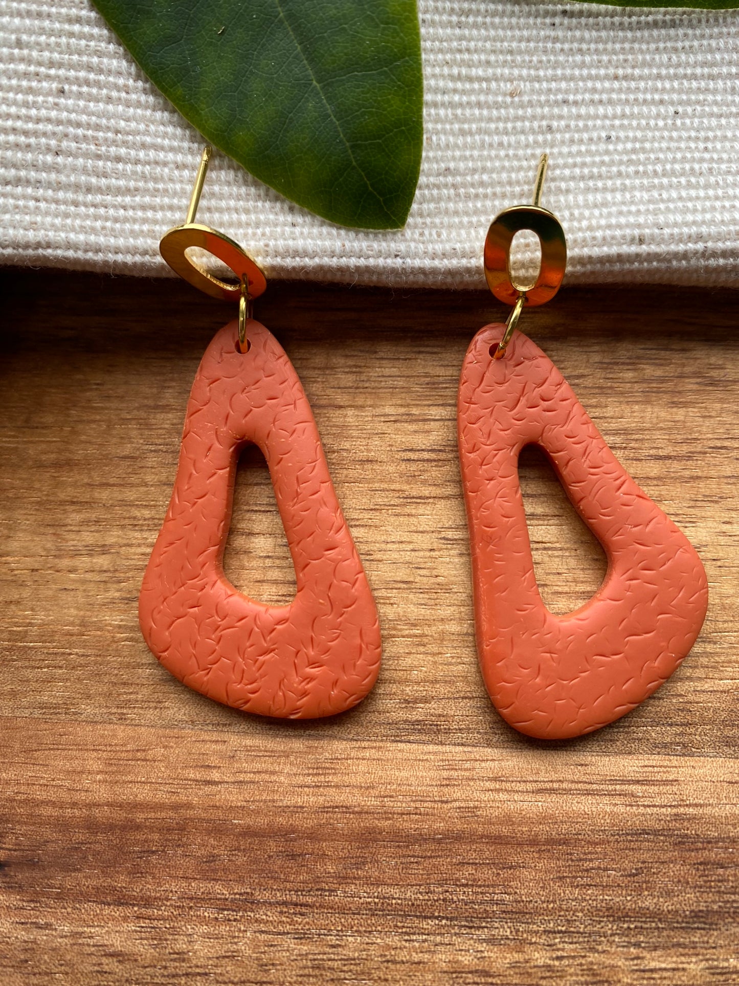 Medium dangles - orange organic wavy triangle