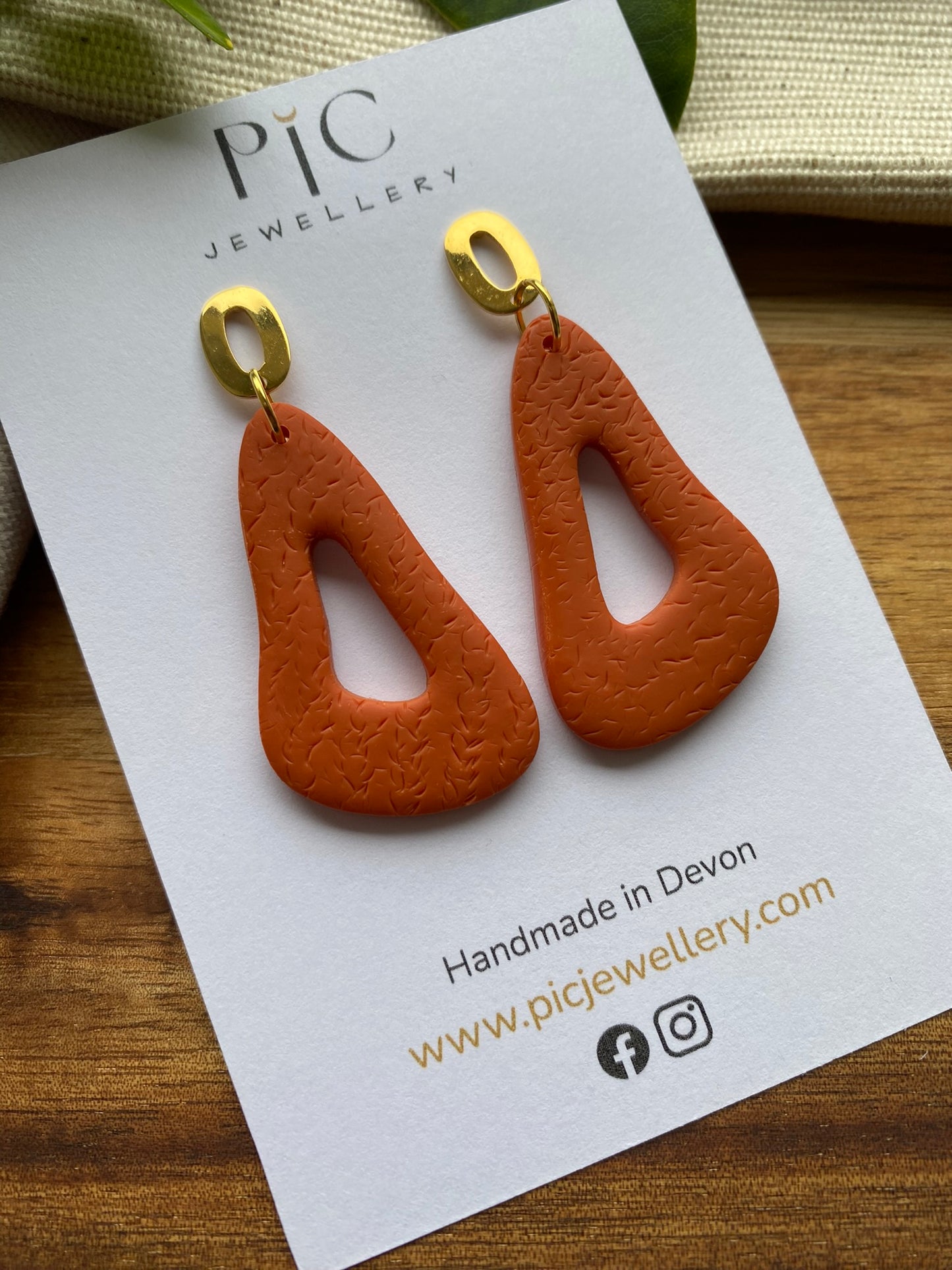 Medium dangles - orange organic wavy triangle