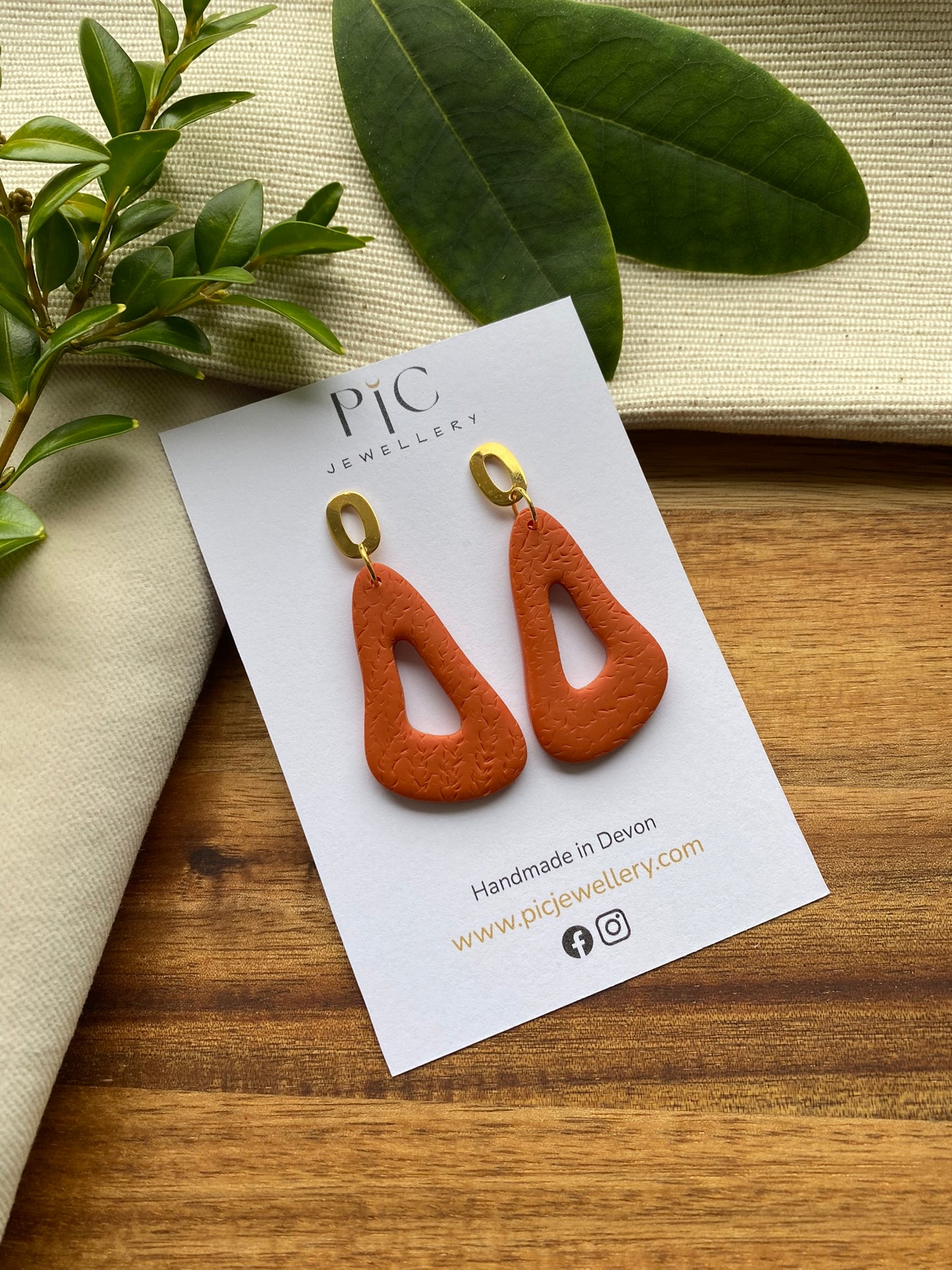 Medium dangles - orange organic wavy triangle