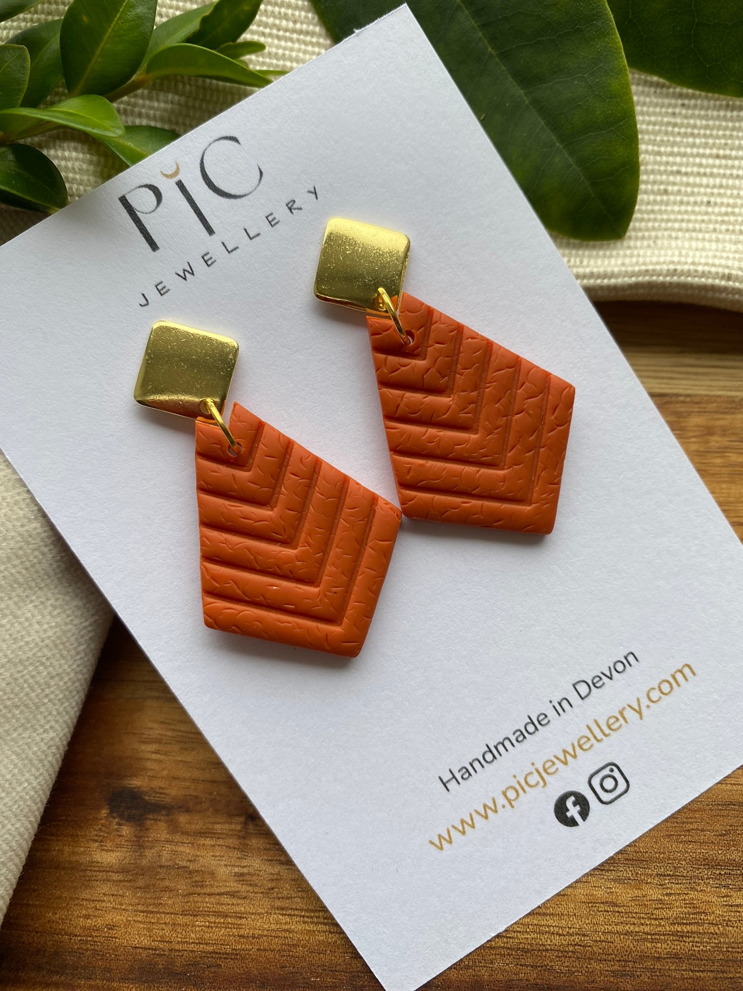 Medium dangles - orange chevron embossed diamond