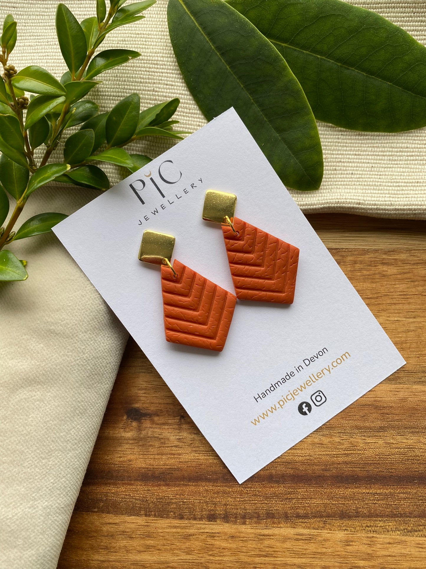 Medium dangles - orange chevron embossed diamond