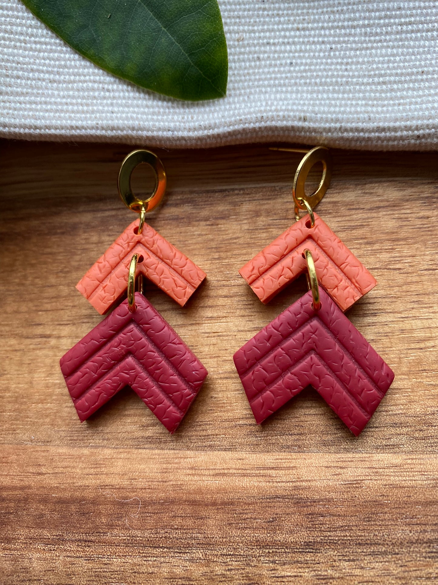 Statement dangles - textured orange and burgundy embossed chevrons
