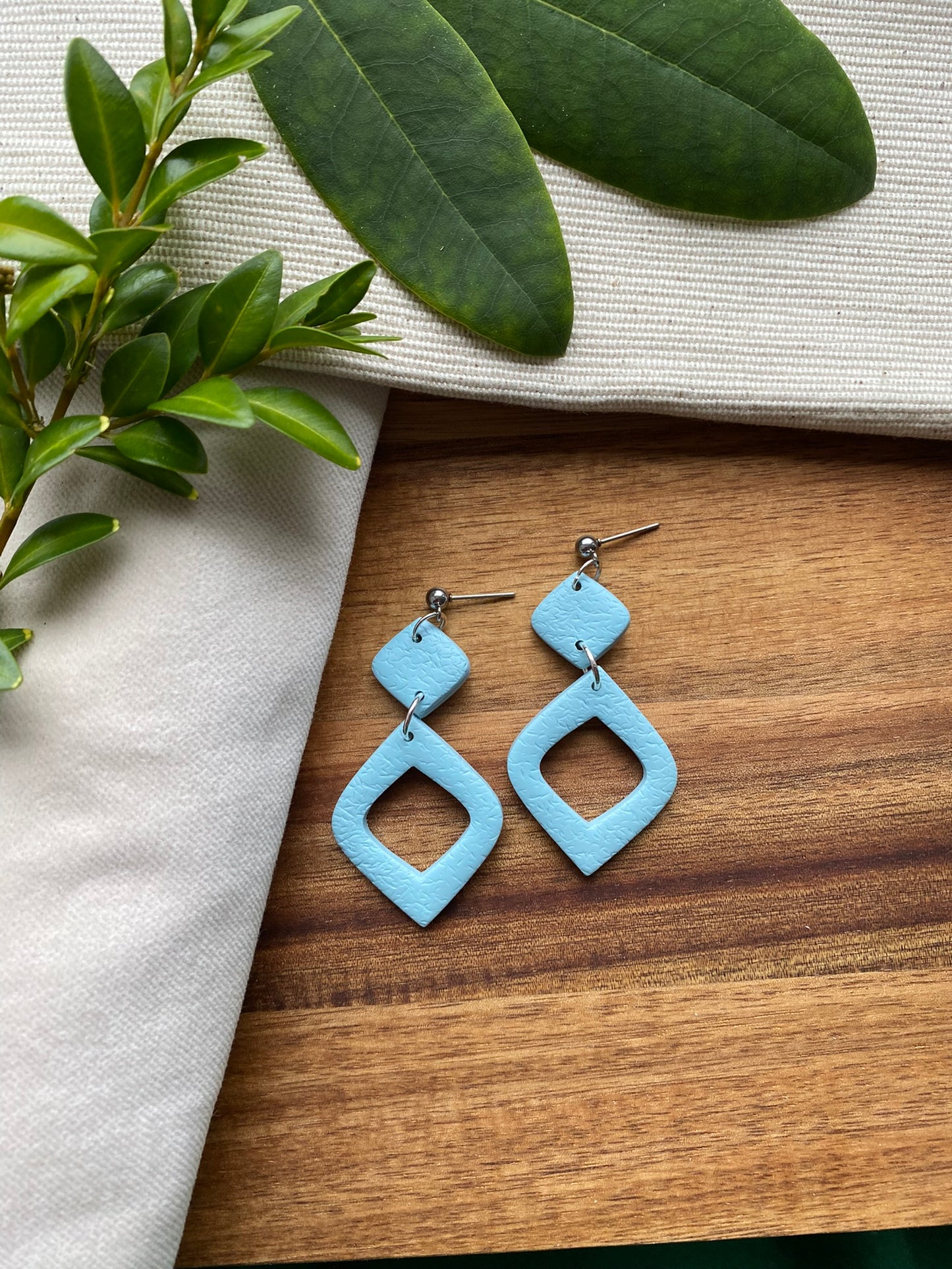 Statement dangles - textured pale blue rounded diamond lantern
