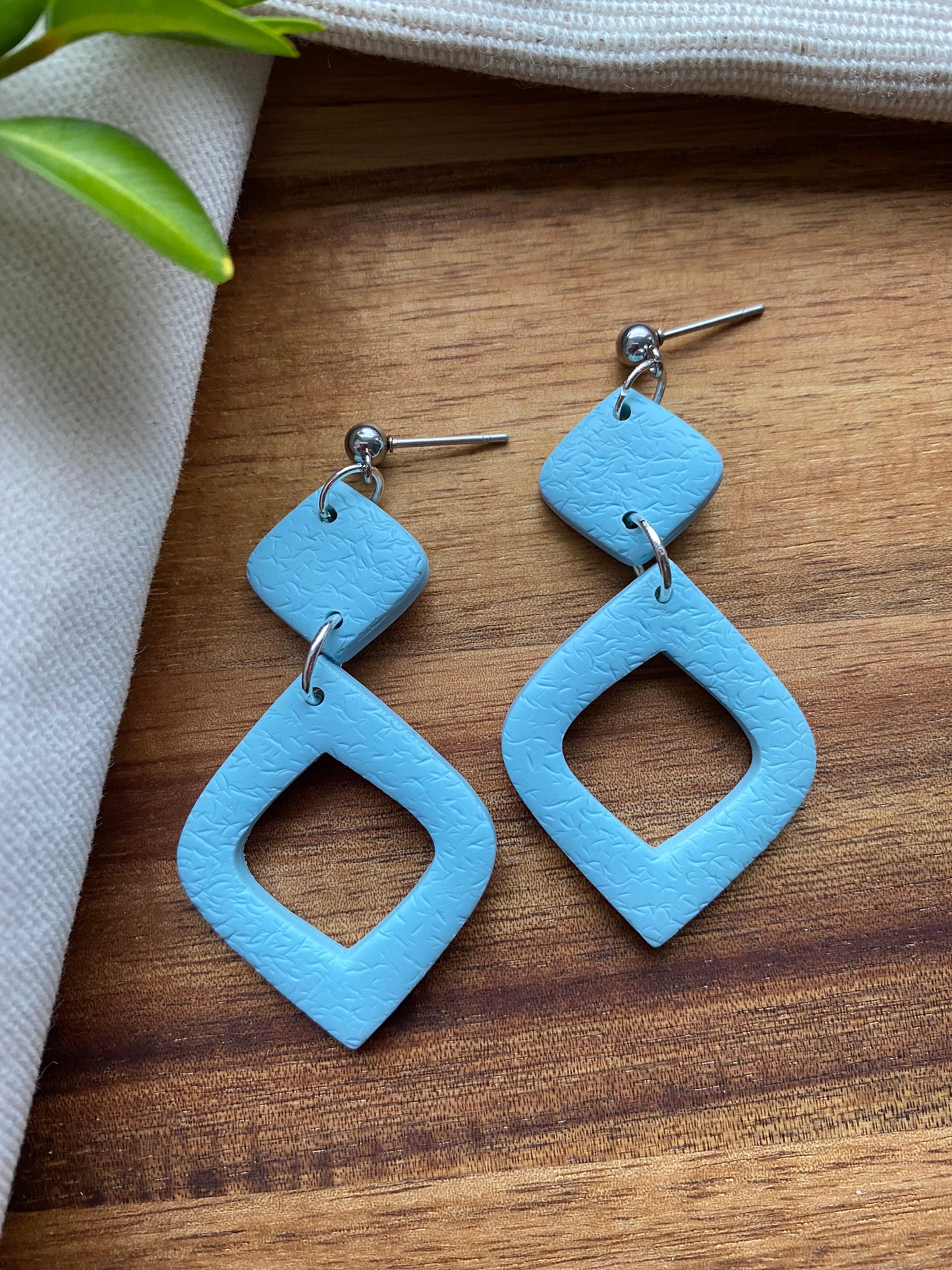 Statement dangles - textured pale blue rounded diamond lantern