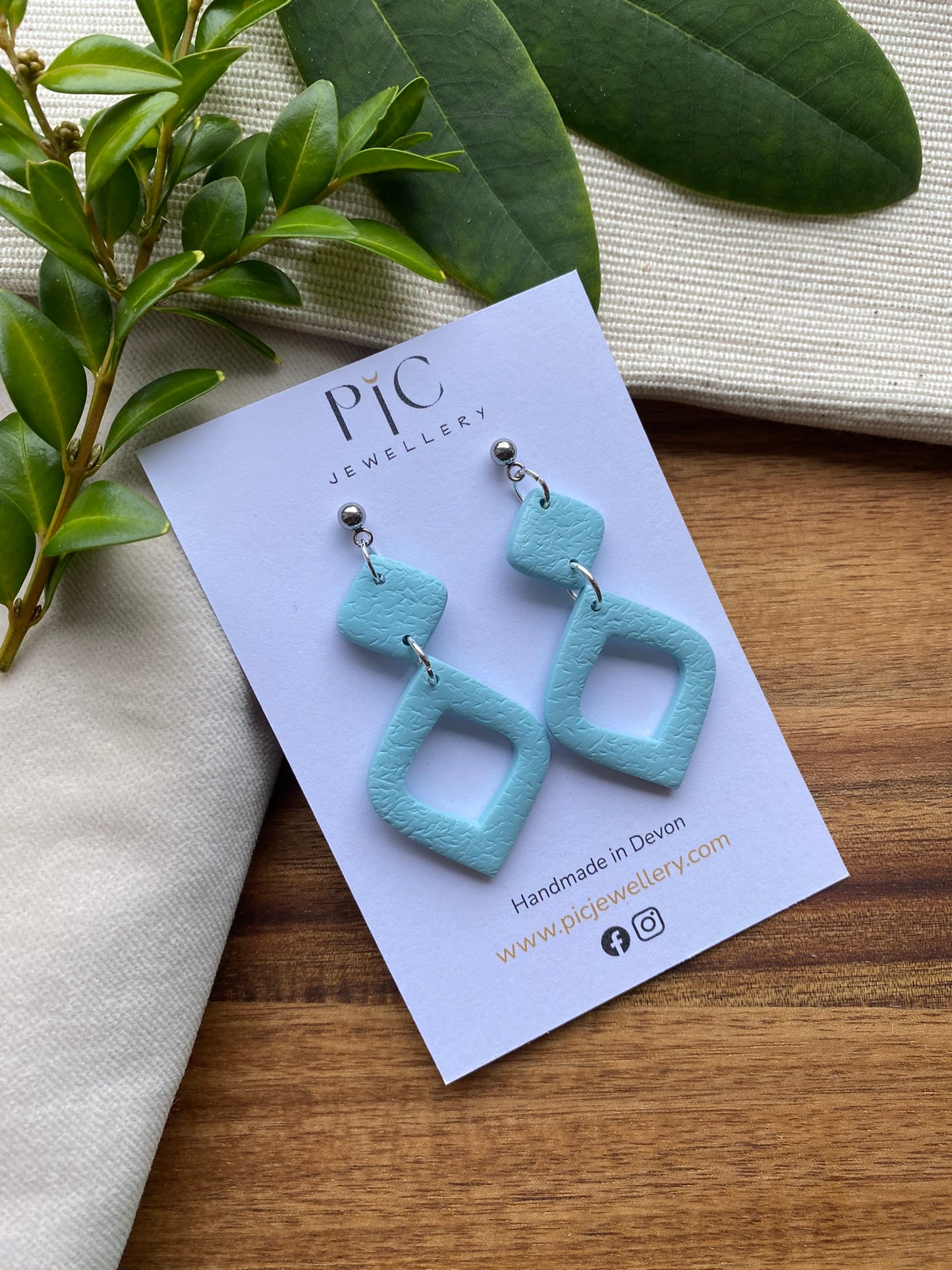 Statement dangles - textured pale blue rounded diamond lantern