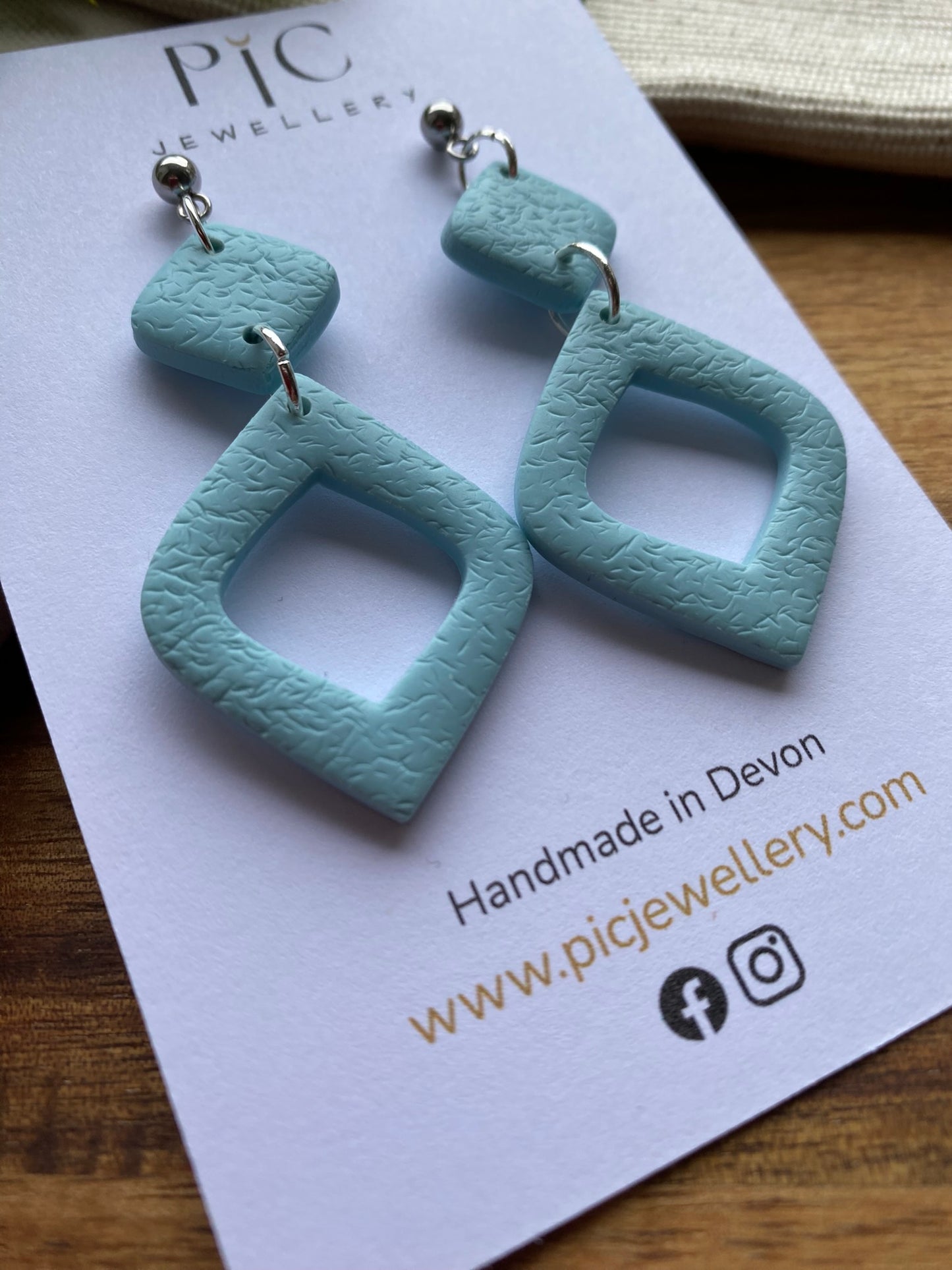 Statement dangles - textured pale blue rounded diamond lantern