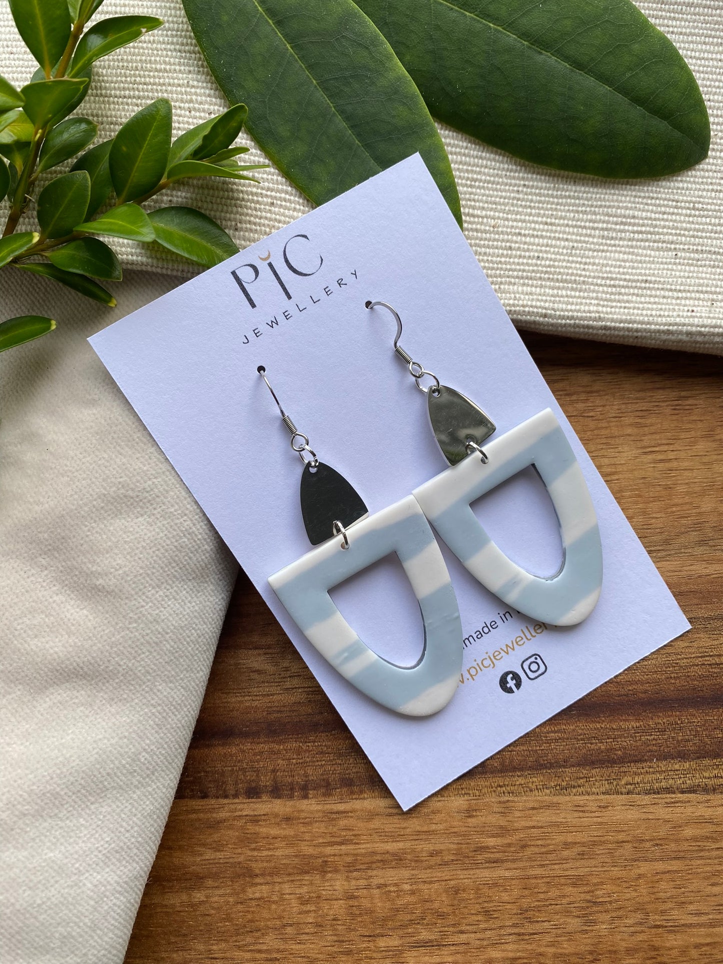 Statement dangles - white and grey arches with stainless steel metal arch