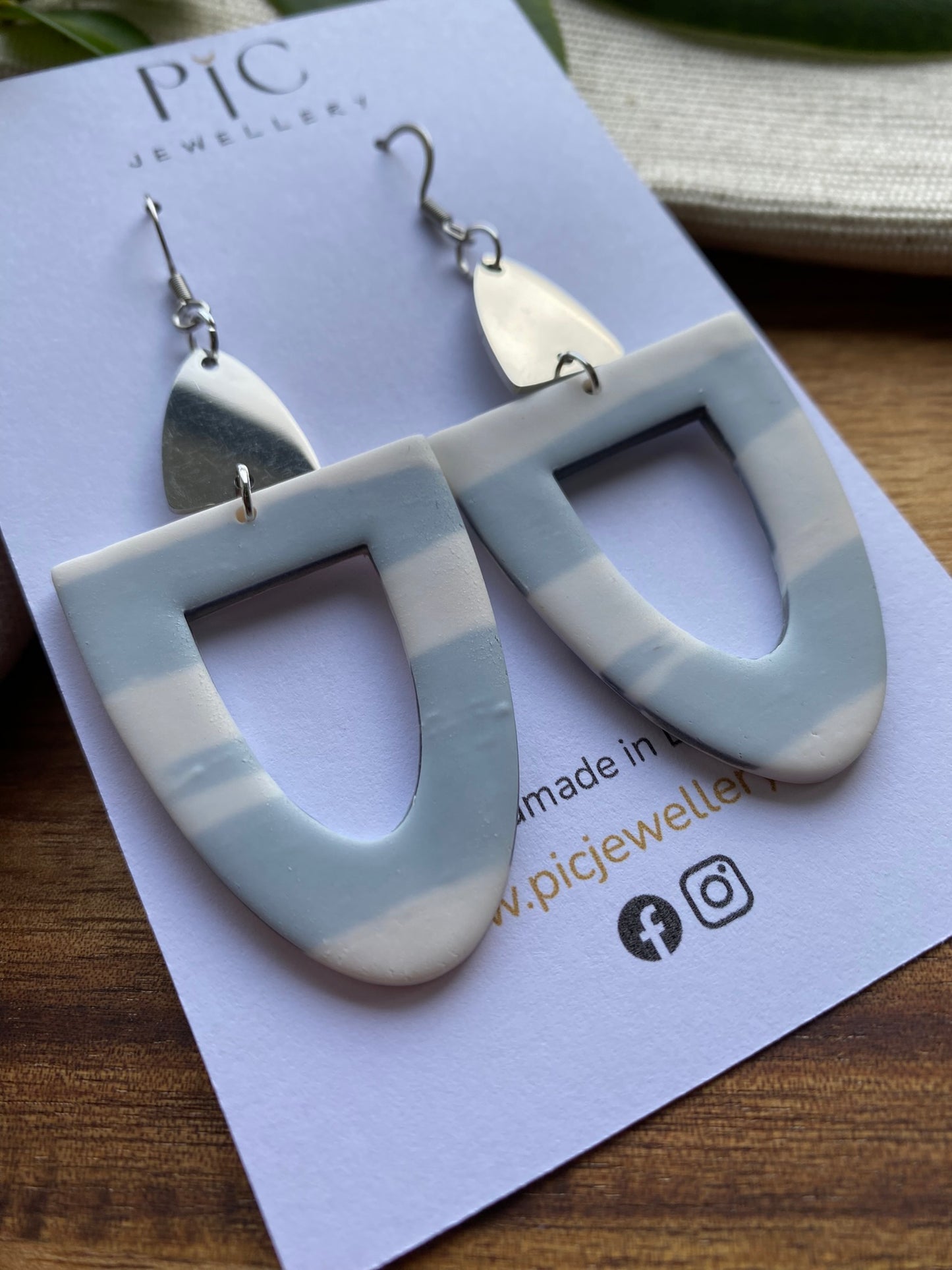 Statement dangles - white and grey arches with stainless steel metal arch