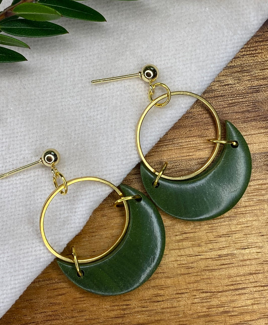 Statement dangles - green moons with gold circle