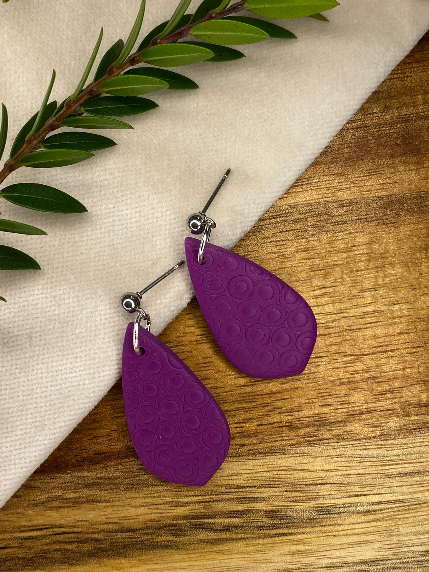 Medium dangles - tiny circle textured purple teardrops