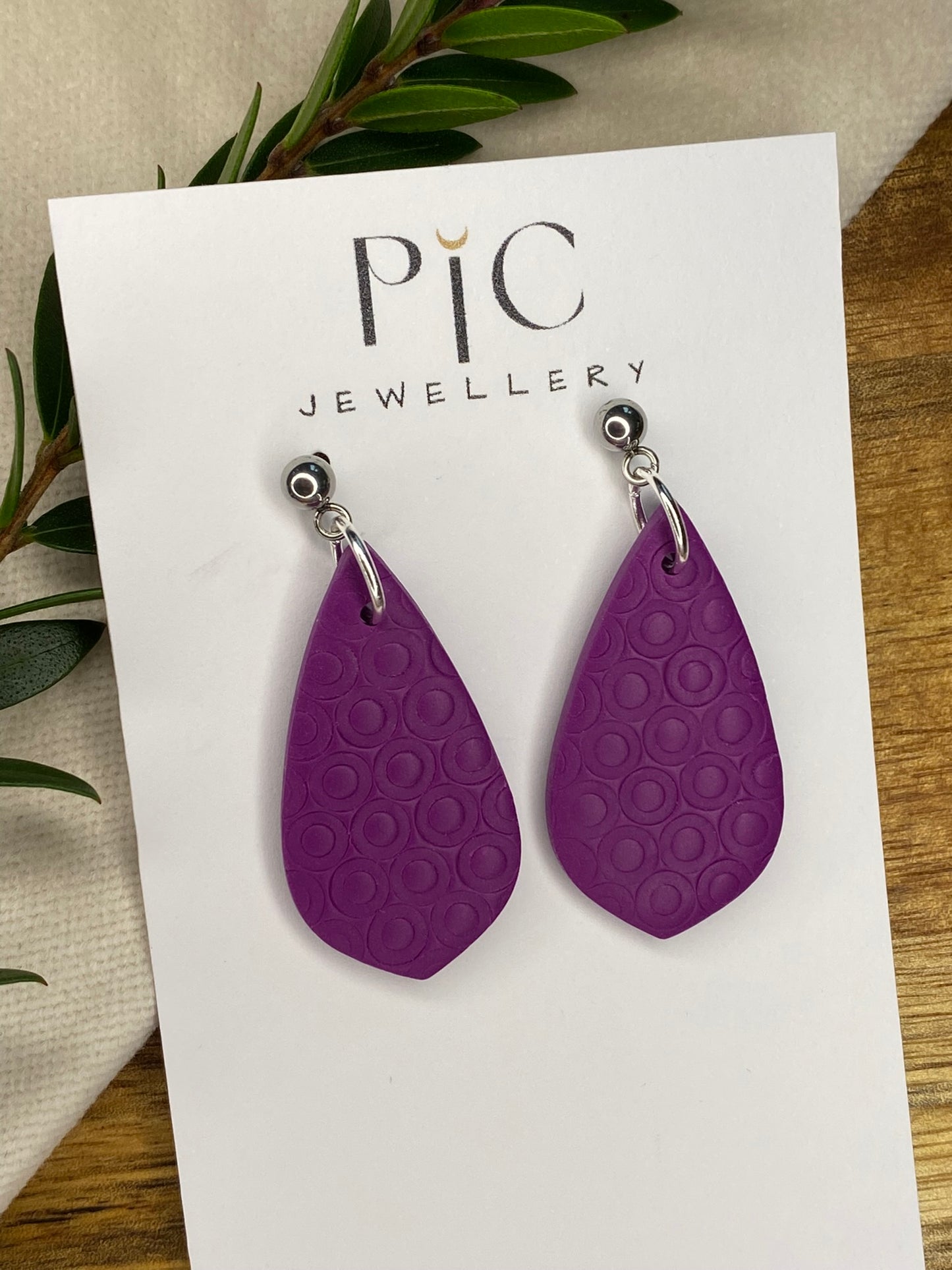 Medium dangles - tiny circle textured purple teardrops