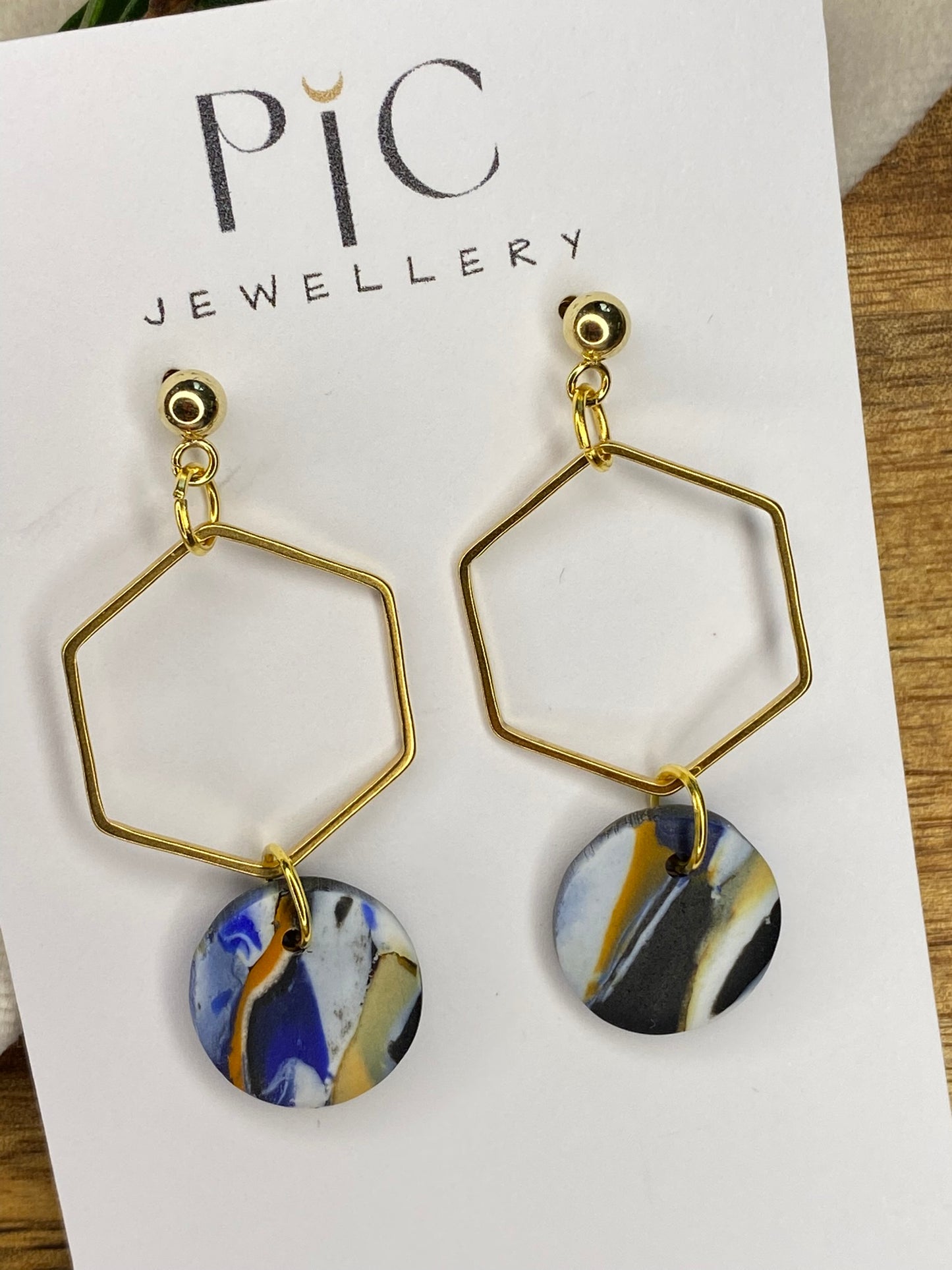 Statement dangles - blue, orange, white and black mix circles with gold hexagon