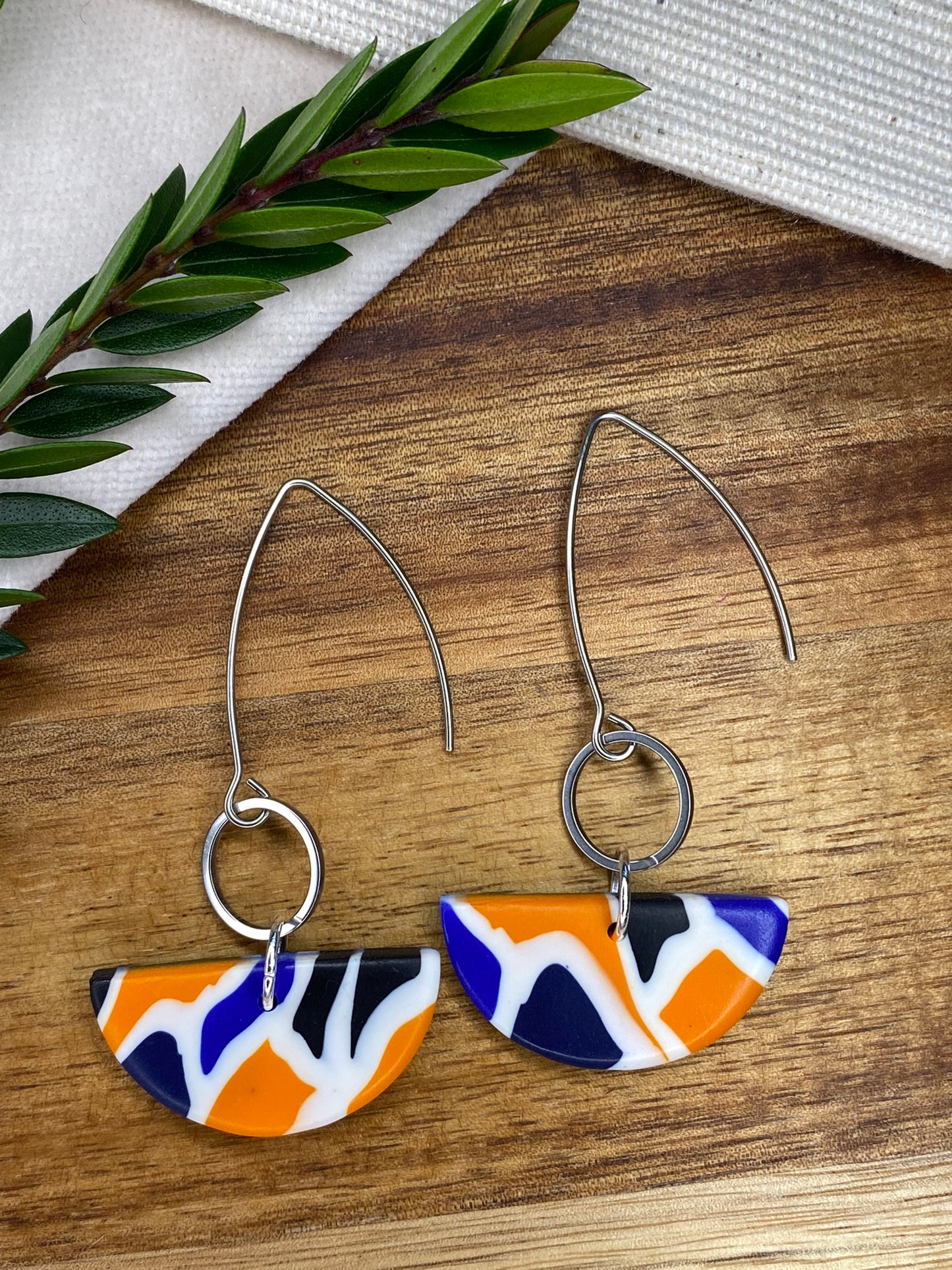 Statement dangles - blue, orange, white and black mix semi-circles