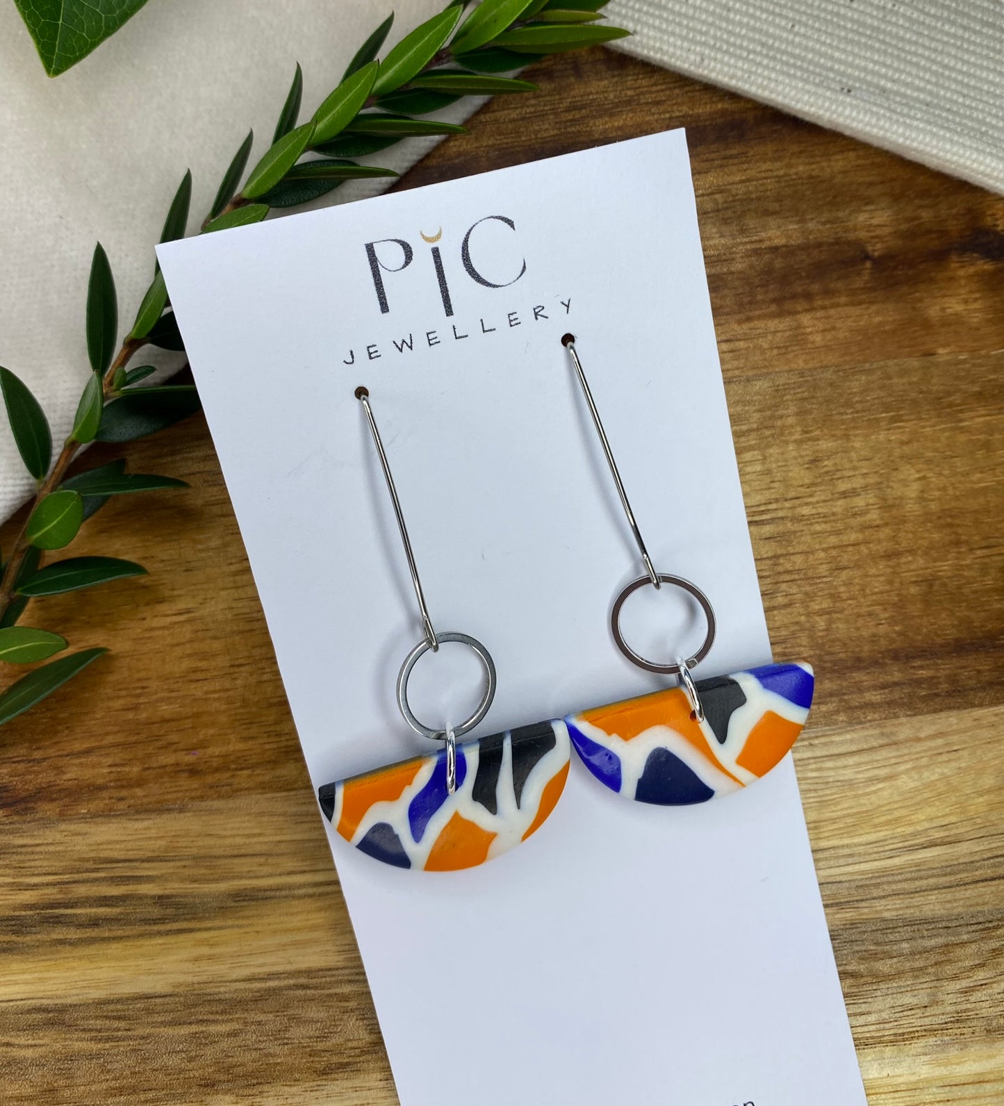 Statement dangles - blue, orange, white and black mix semi-circles