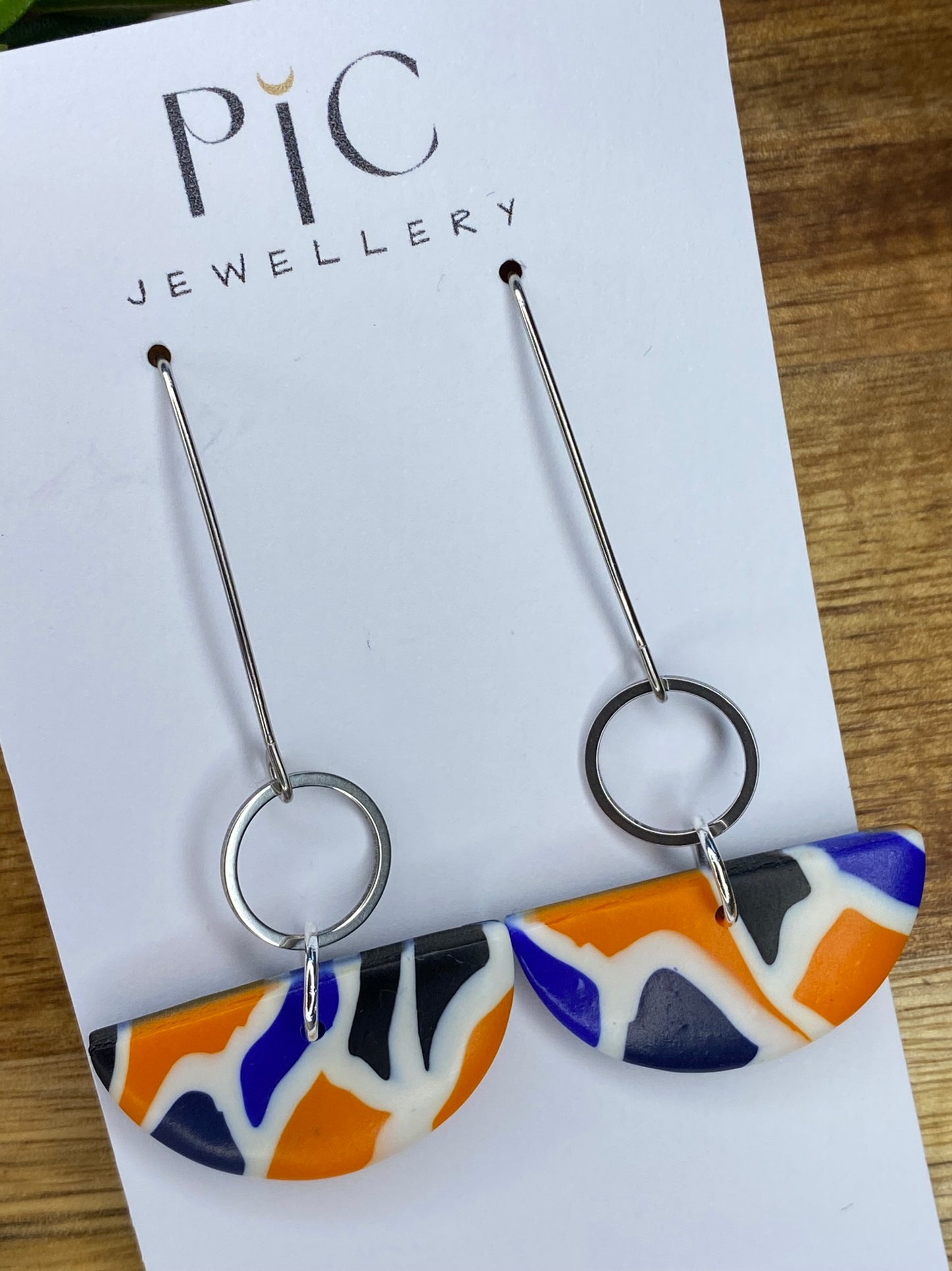 Statement dangles - blue, orange, white and black mix semi-circles