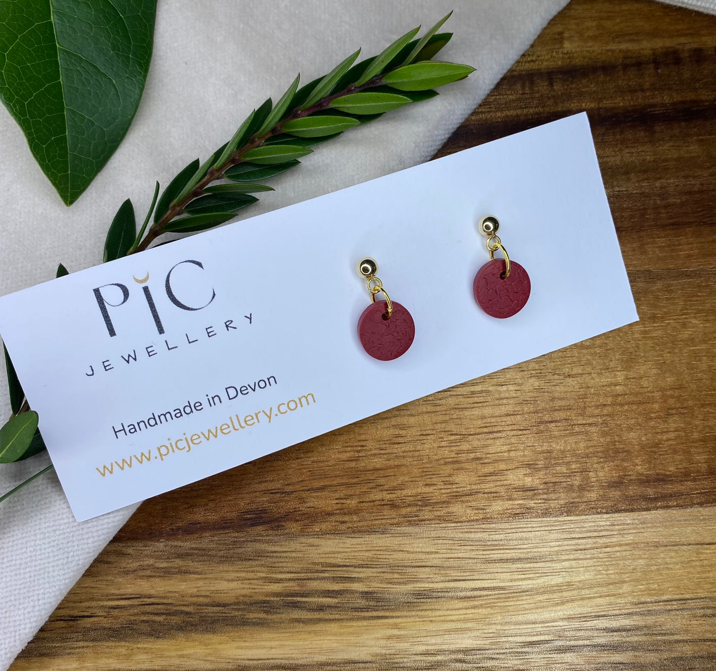 Dinky dangles - textured burgundy circles