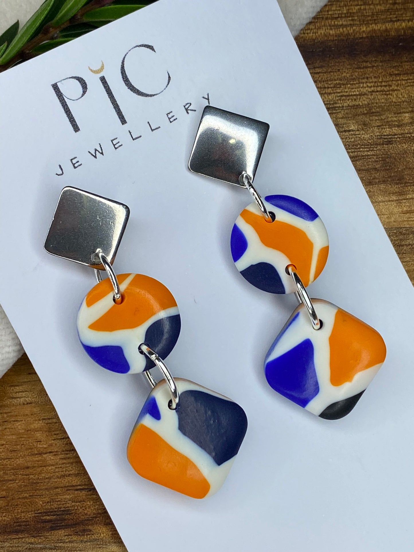 Statement dangles - blue, orange, white and black mix rhombus and circles