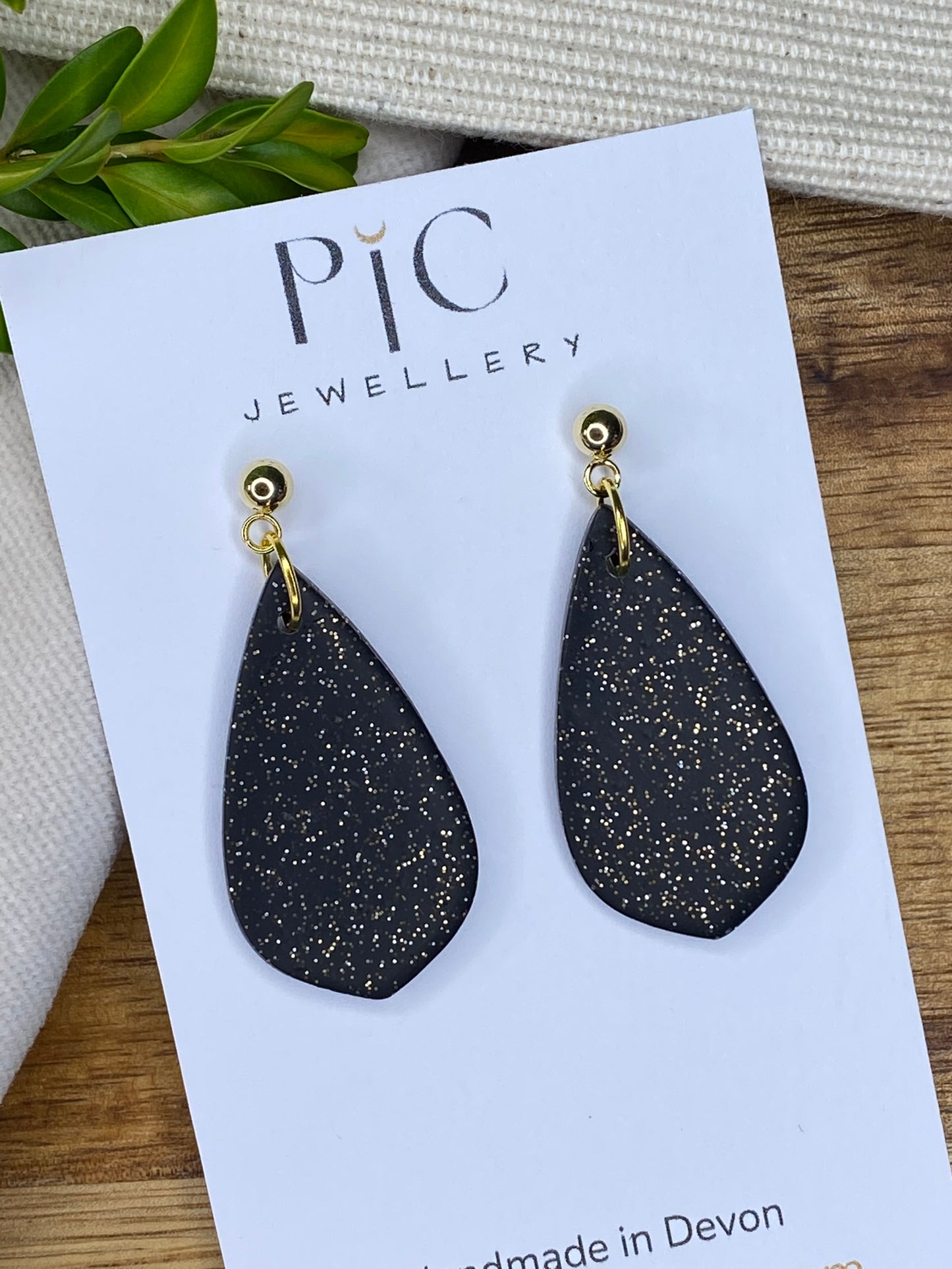 Medium dangles - black with gold glitter teardrops