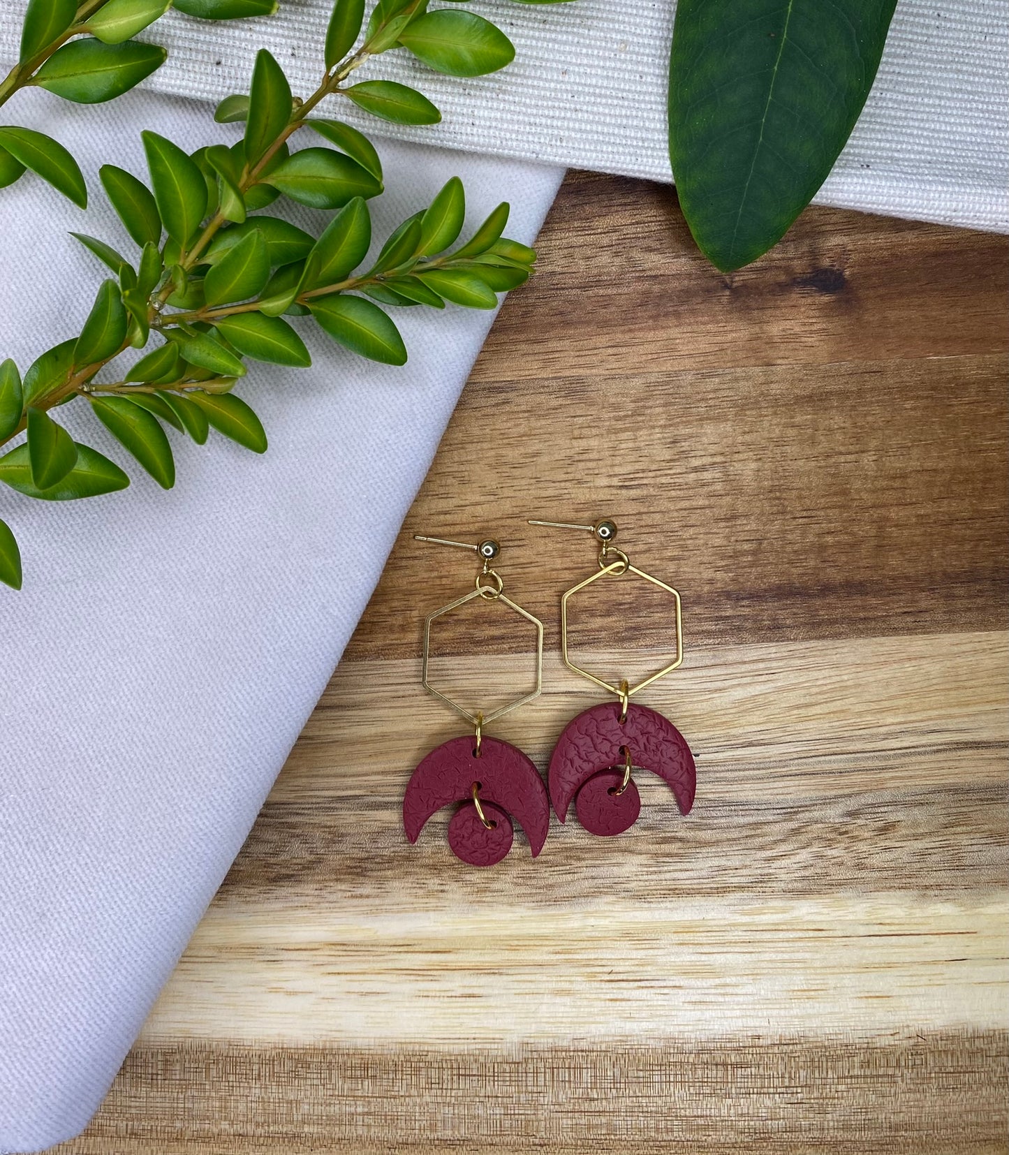 Statement dangles - textured burgundy crescent moons and circles with gold hexagon