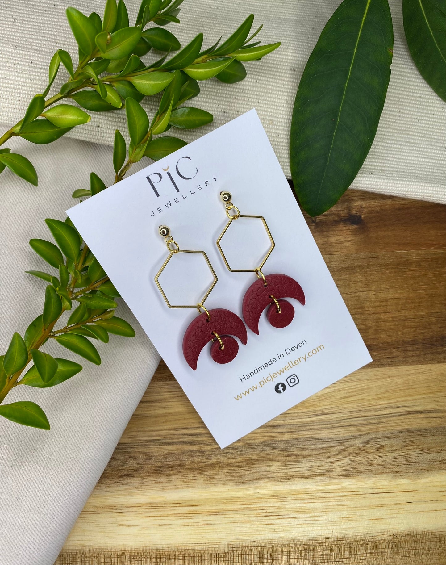 Statement dangles - textured burgundy crescent moons and circles with gold hexagon