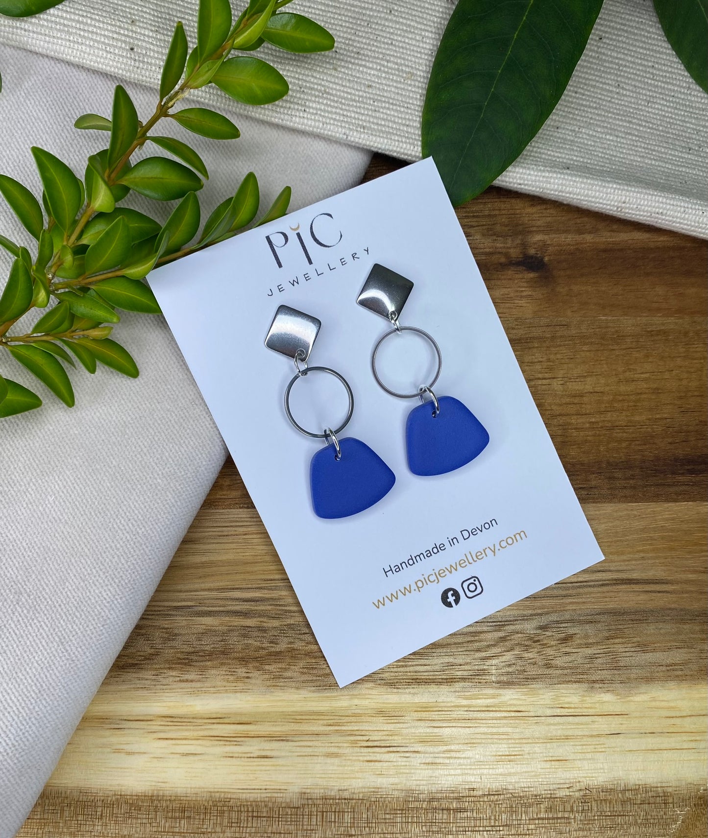 Statement dangles - cornflower blue rounded trapezium and silver circle