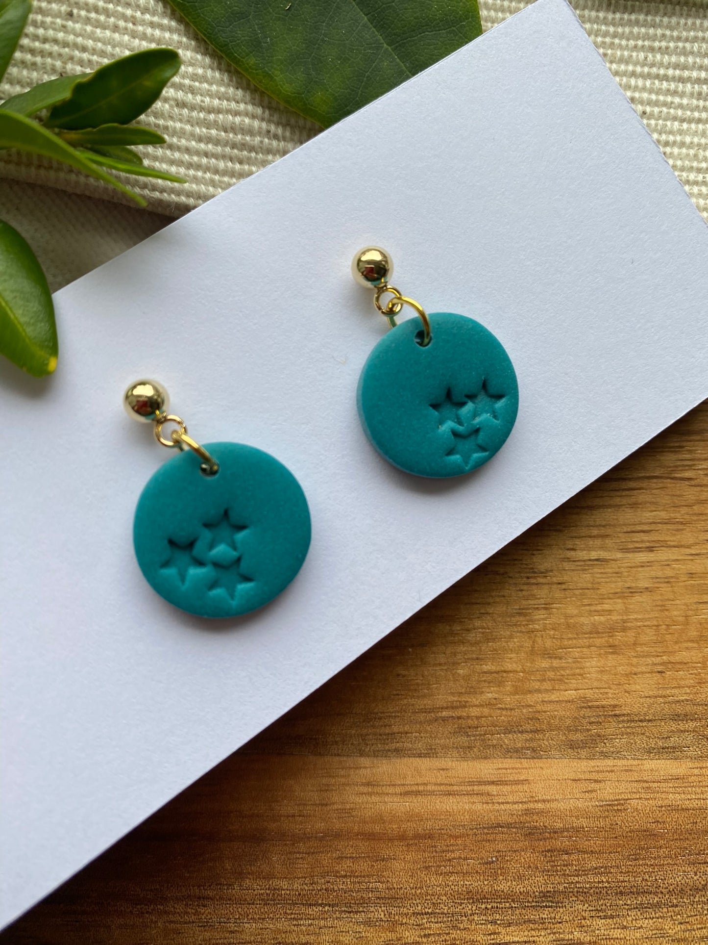 Dinky dangles - teal triple star embossed circles