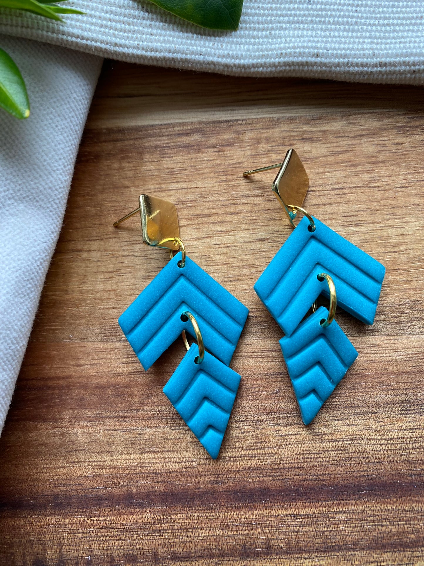 Statement dangles - teal chevron embossed split kite