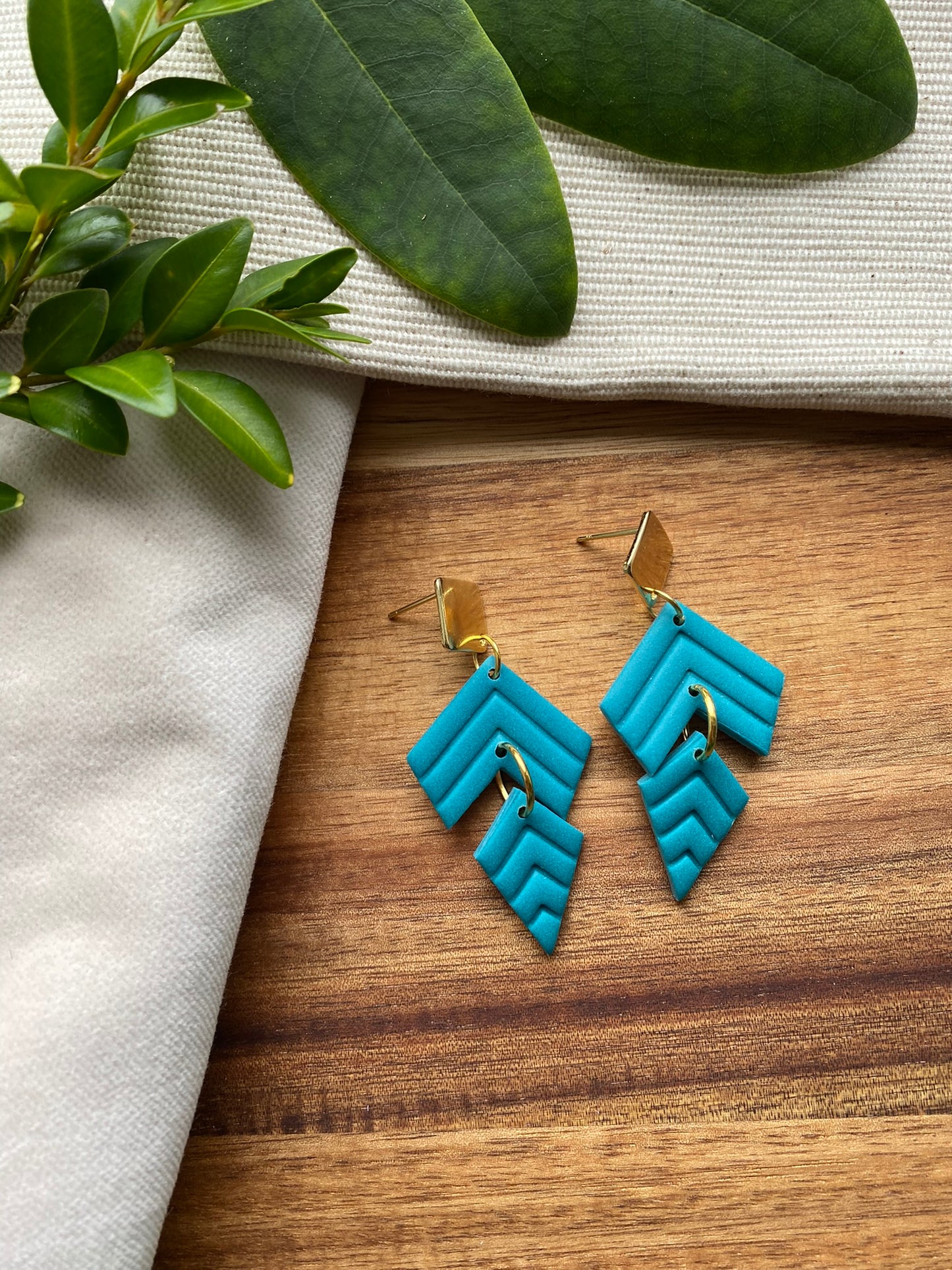 Statement dangles - teal chevron embossed split kite