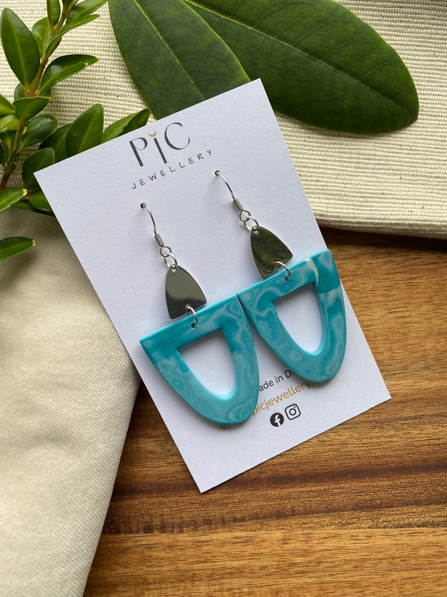 Statement dangles - teal arches with stainless steel metal arch