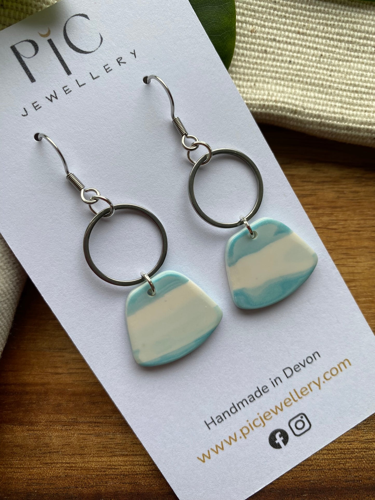 Statement dangles - teal and white rounded trapezium and silver circle