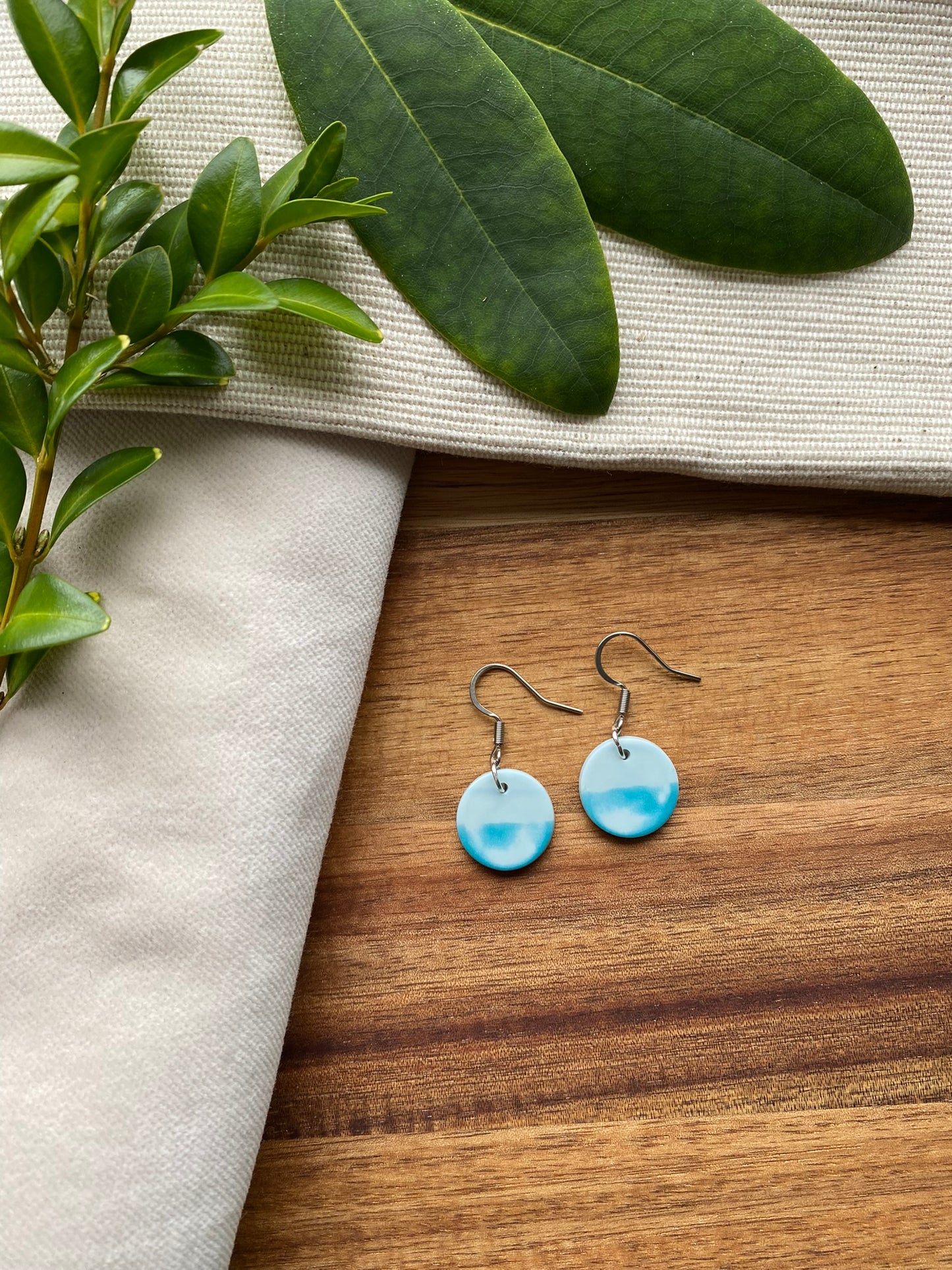 Dinky dangles - polished teal and white sea and sky circles