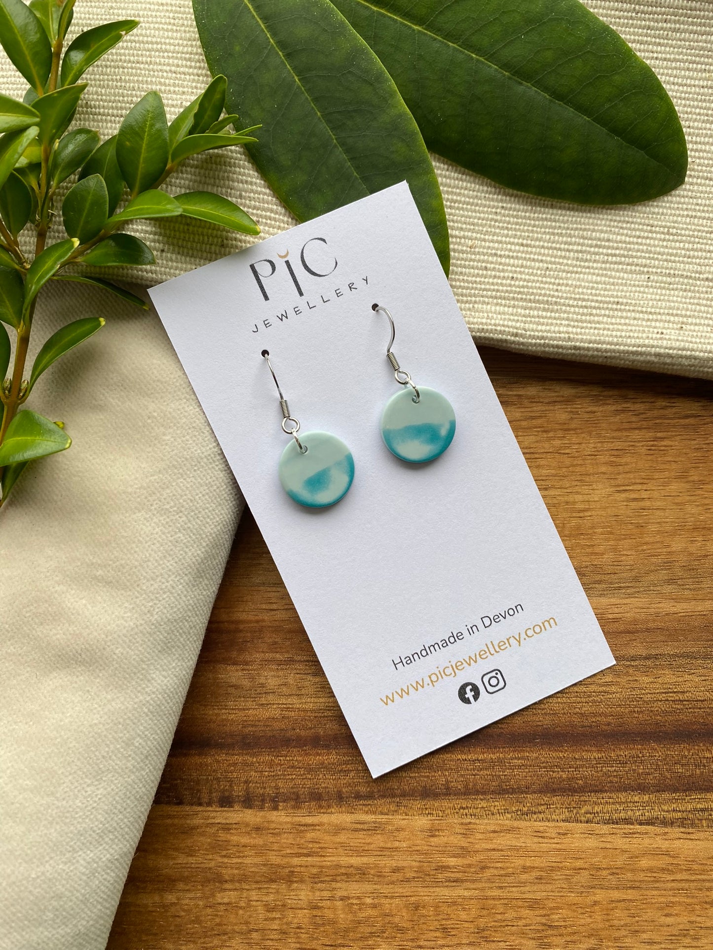 Dinky dangles - polished teal and white sea and sky circles