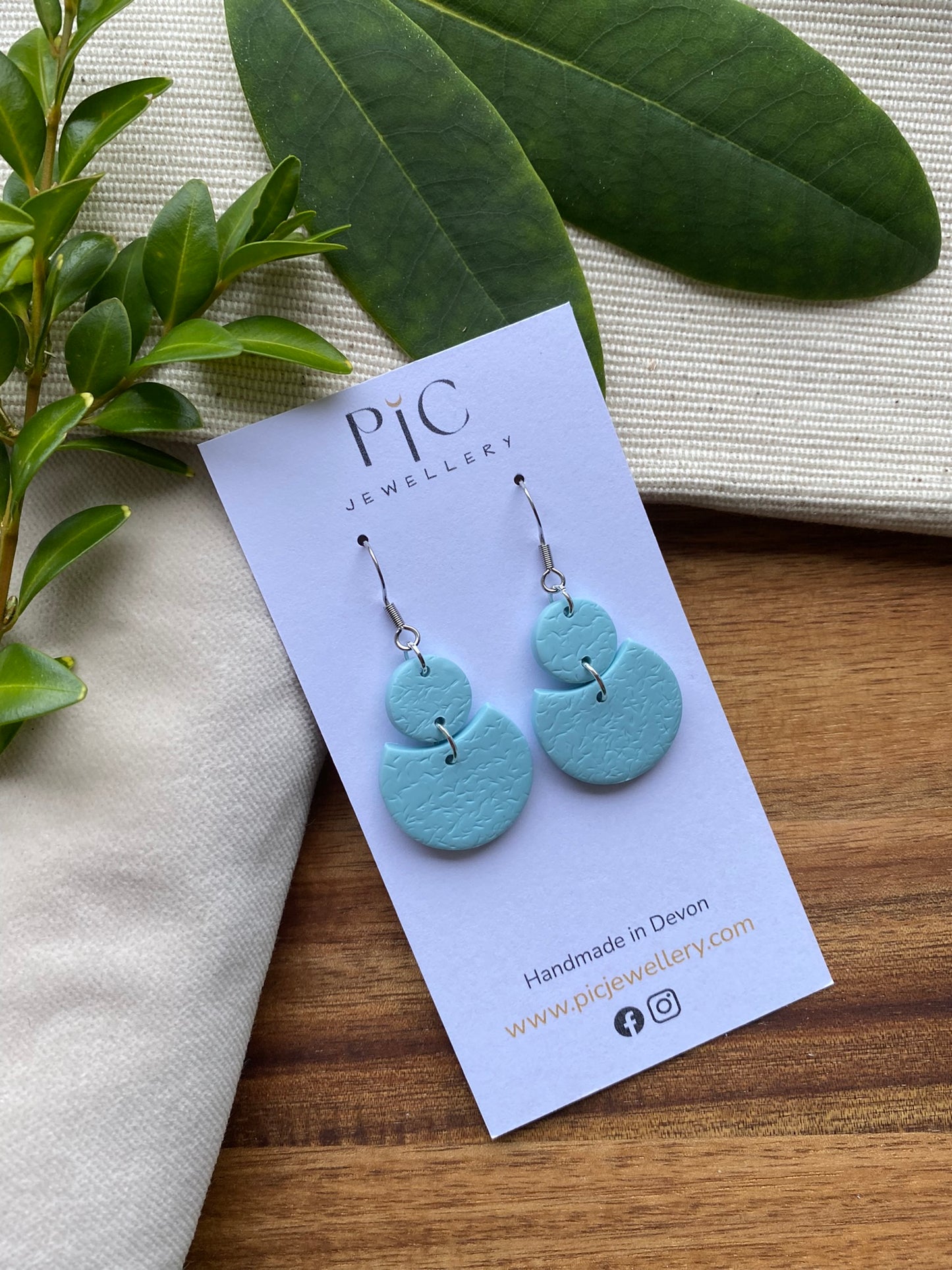 Medium dangles - textured pale blue circle and circle segment