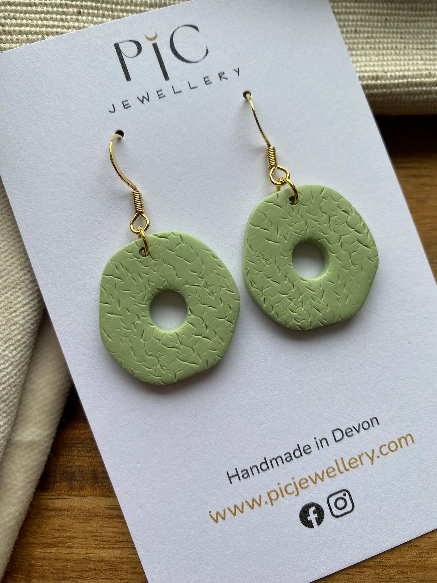 Medium dangles - textured pale mint green organic doughnuts