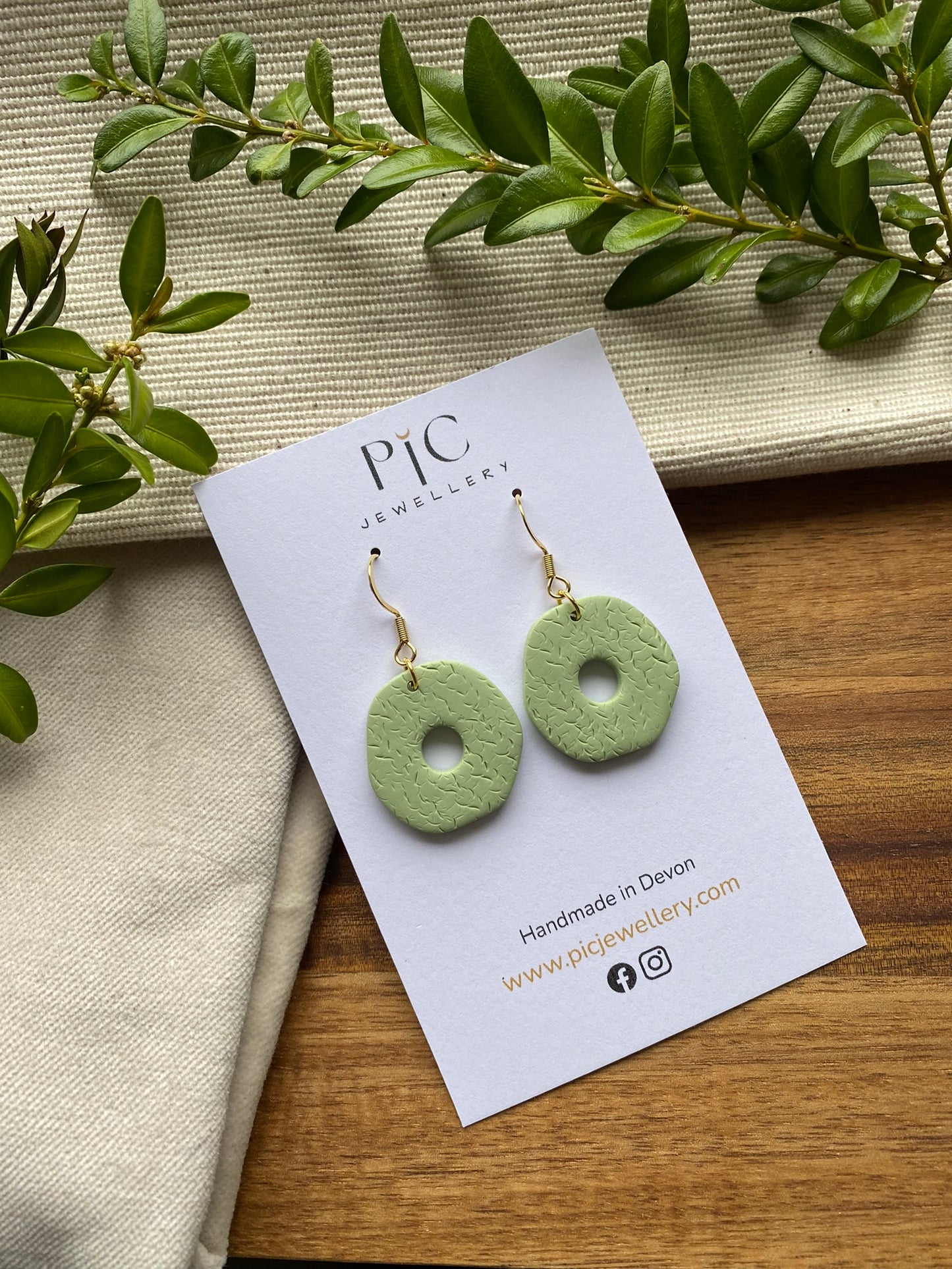 Medium dangles - textured pale mint green organic doughnuts