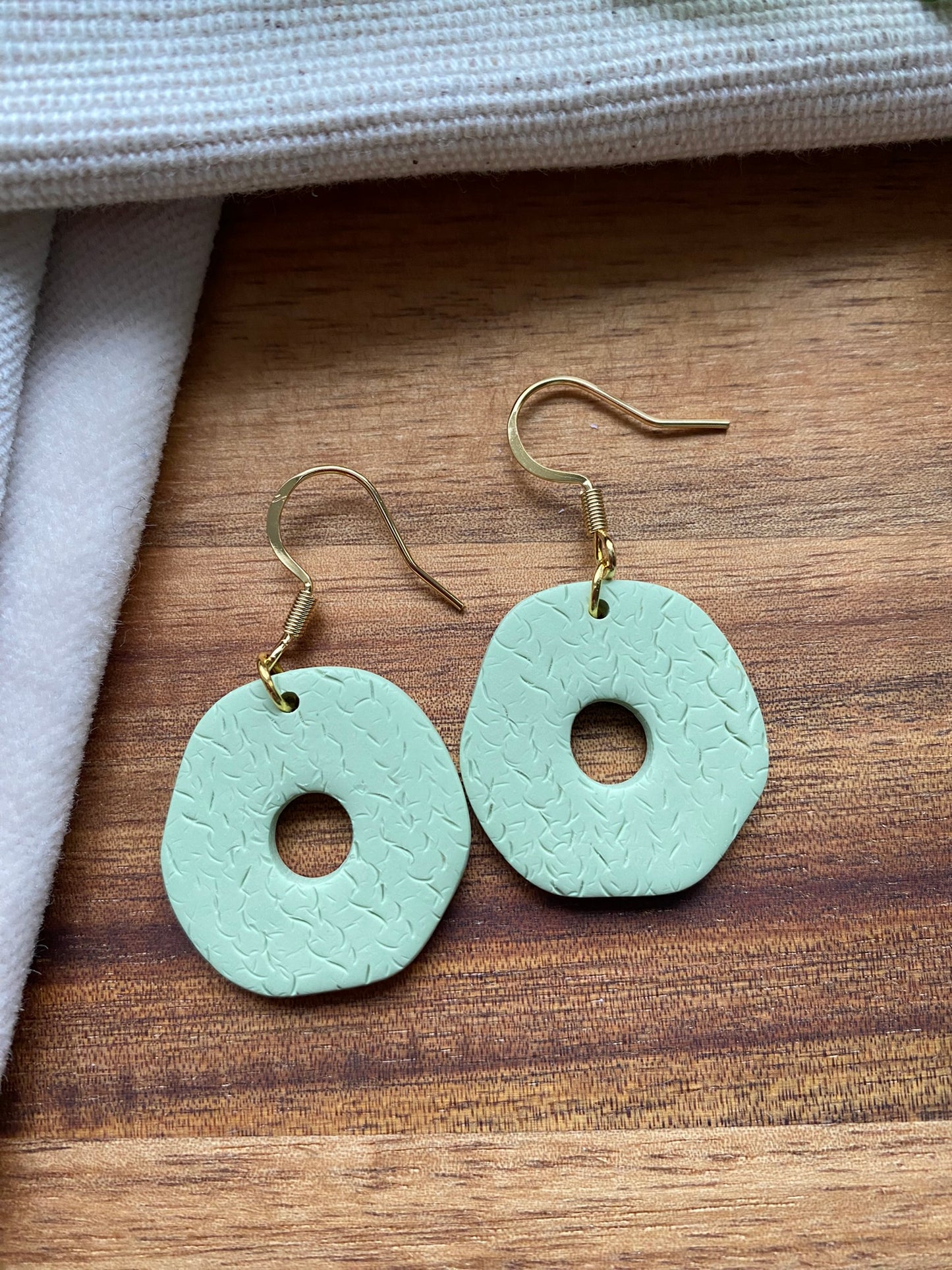 Medium dangles - textured pale mint green organic doughnuts