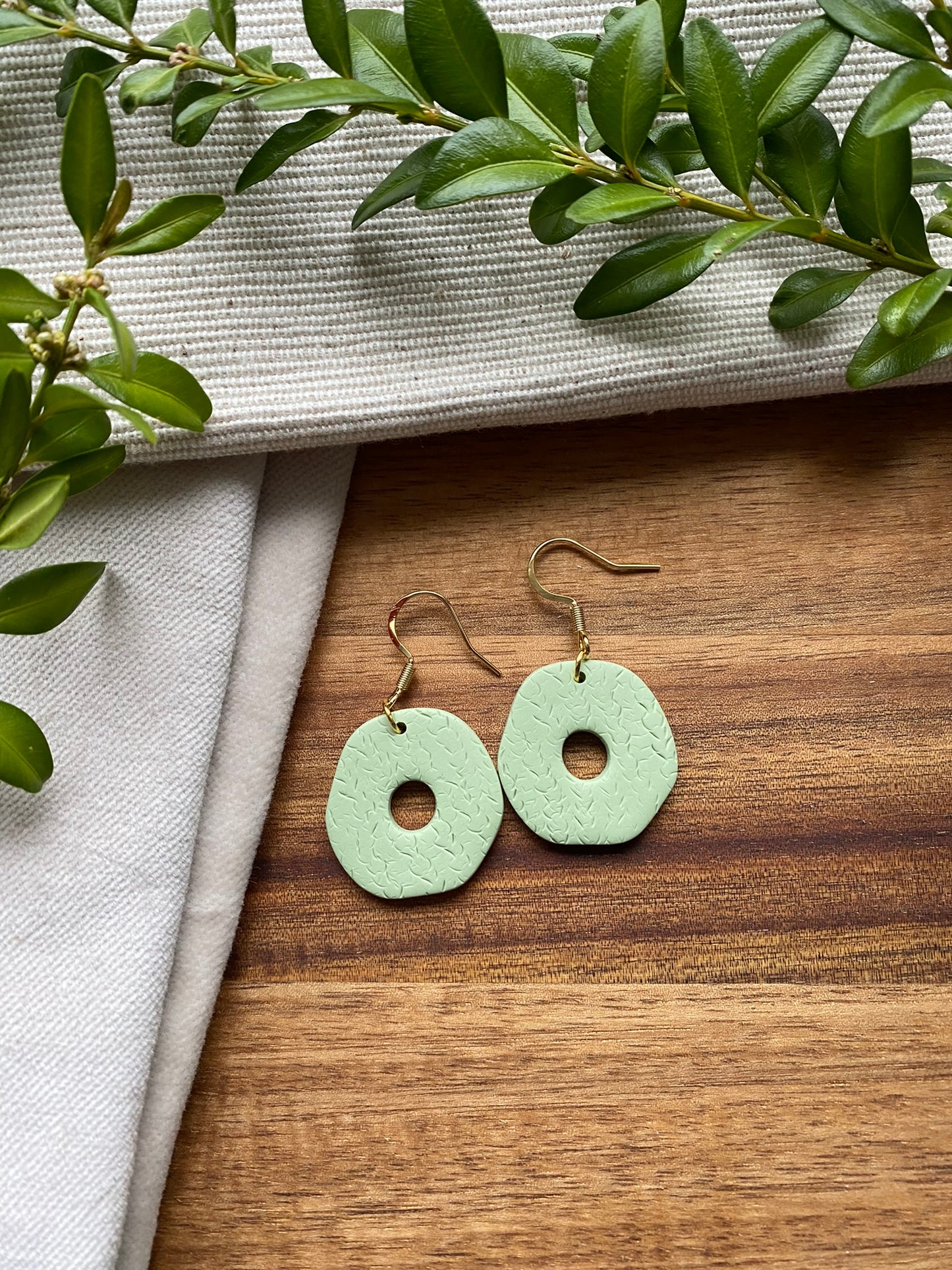 Medium dangles - textured pale mint green organic doughnuts