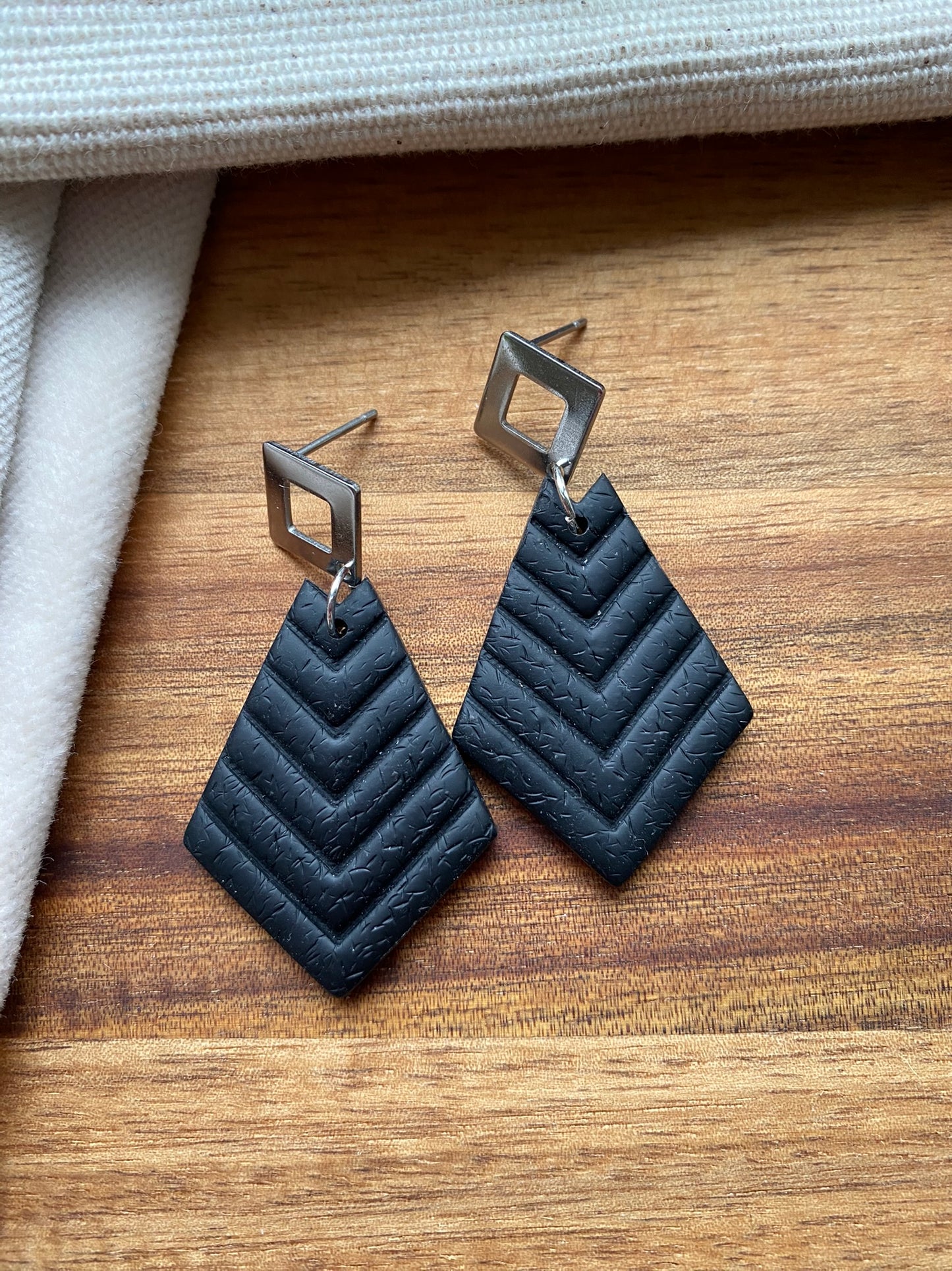 Medium dangles - black chevron embossed diamond